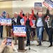 Jen Schultz (center) announced Tuesday in Duluth that she will run against Rep. Pete Stauber for the Eighth District Congressional Seat. She was backe