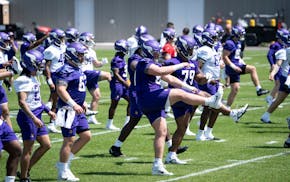 Players warm up during the Vikings' rookie minicamp on Friday at TCO Performance Center in Eagan.