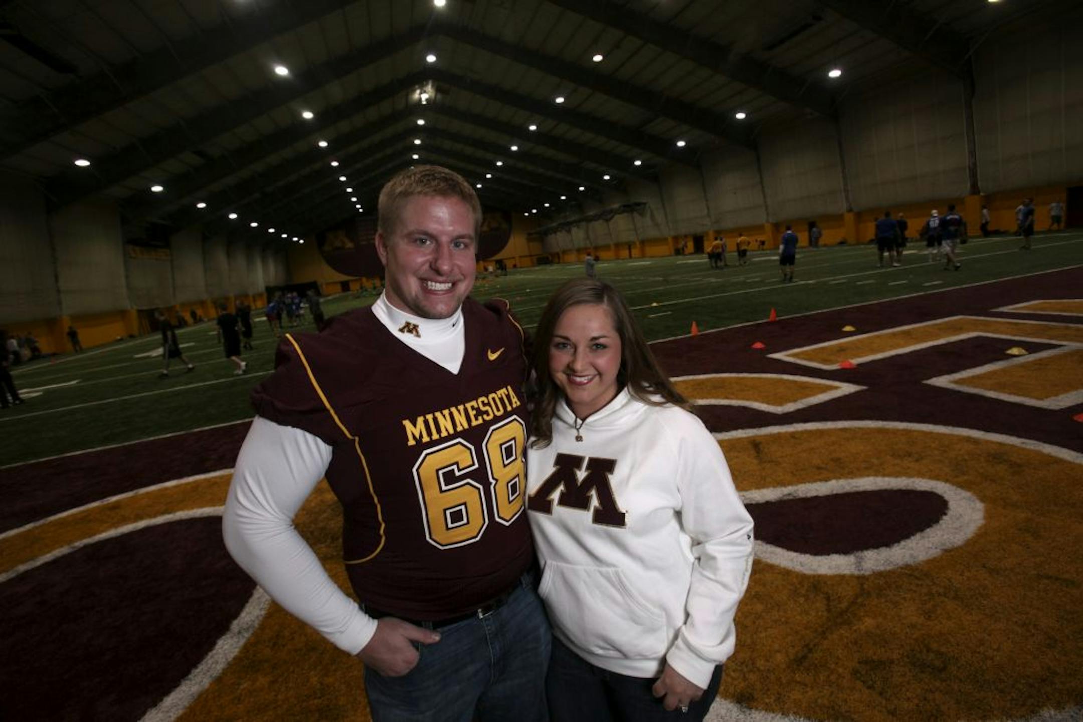 Gopher senior offensive lineman Chris Bunders stood with his finance Jen Polaski at the Bierman football complex in Minneapolis Wednesday, November 16, 2011