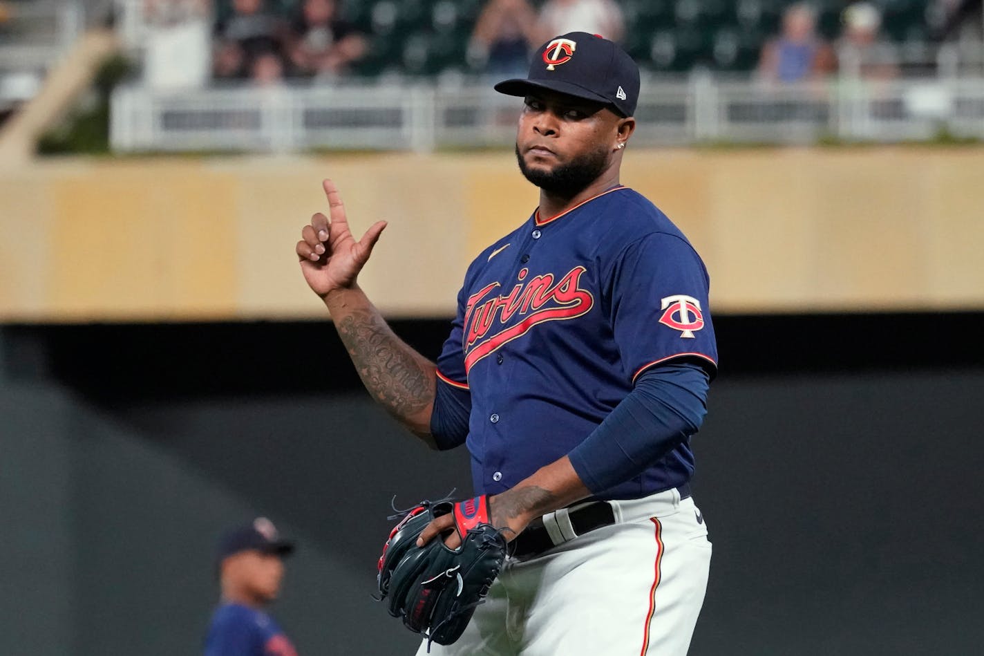 Minnesota Twins pitcher Alex Colome celebrates the final out as the Twins defeated the Chicago White Sox 4-3 in a baseball game Tuesday, Aug. 10, 2021, in Minneapolis. Colome earned the save. (AP Photo/Jim Mone)