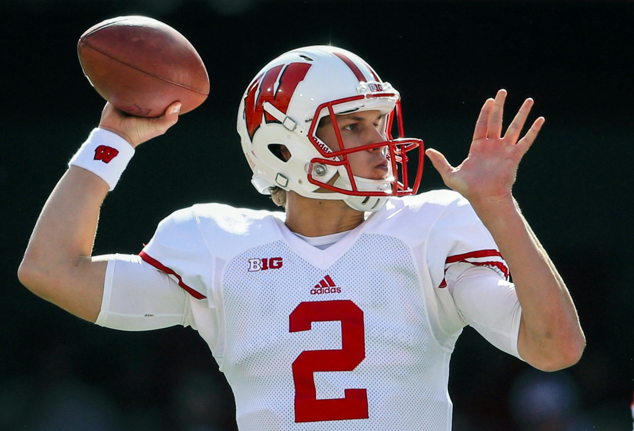 Wisconsin quarterback Joel Stave (2) throws as Wisconsin offensive lineman Walker Williams (62) blocks Nebraska defensive end Jack Gangwish (95) during the first half of an NCAA college football game against Nebraska in Lincoln, Neb., Saturday, Oct. 10, 2015. (AP Photo/Nati Harnik)