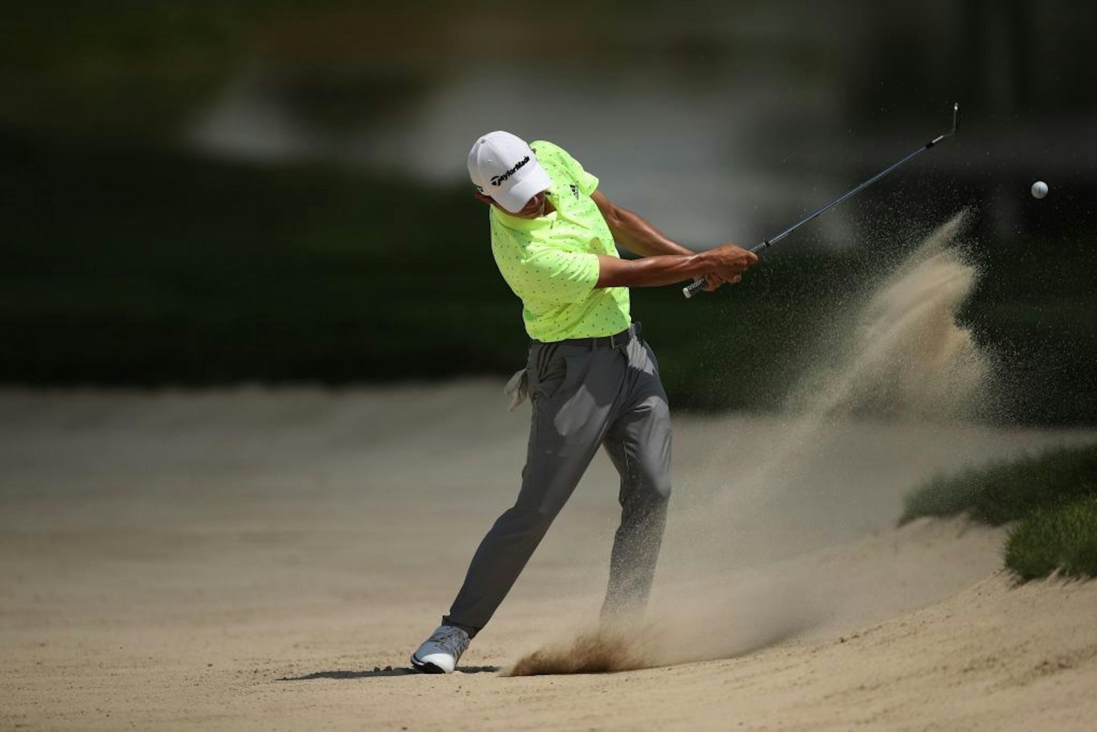 Collin Morikawa hits a shot out of the bunker at 7 during third round action at TPC Twin Cities Saturday July,6 2019 in Blaine, MN.
