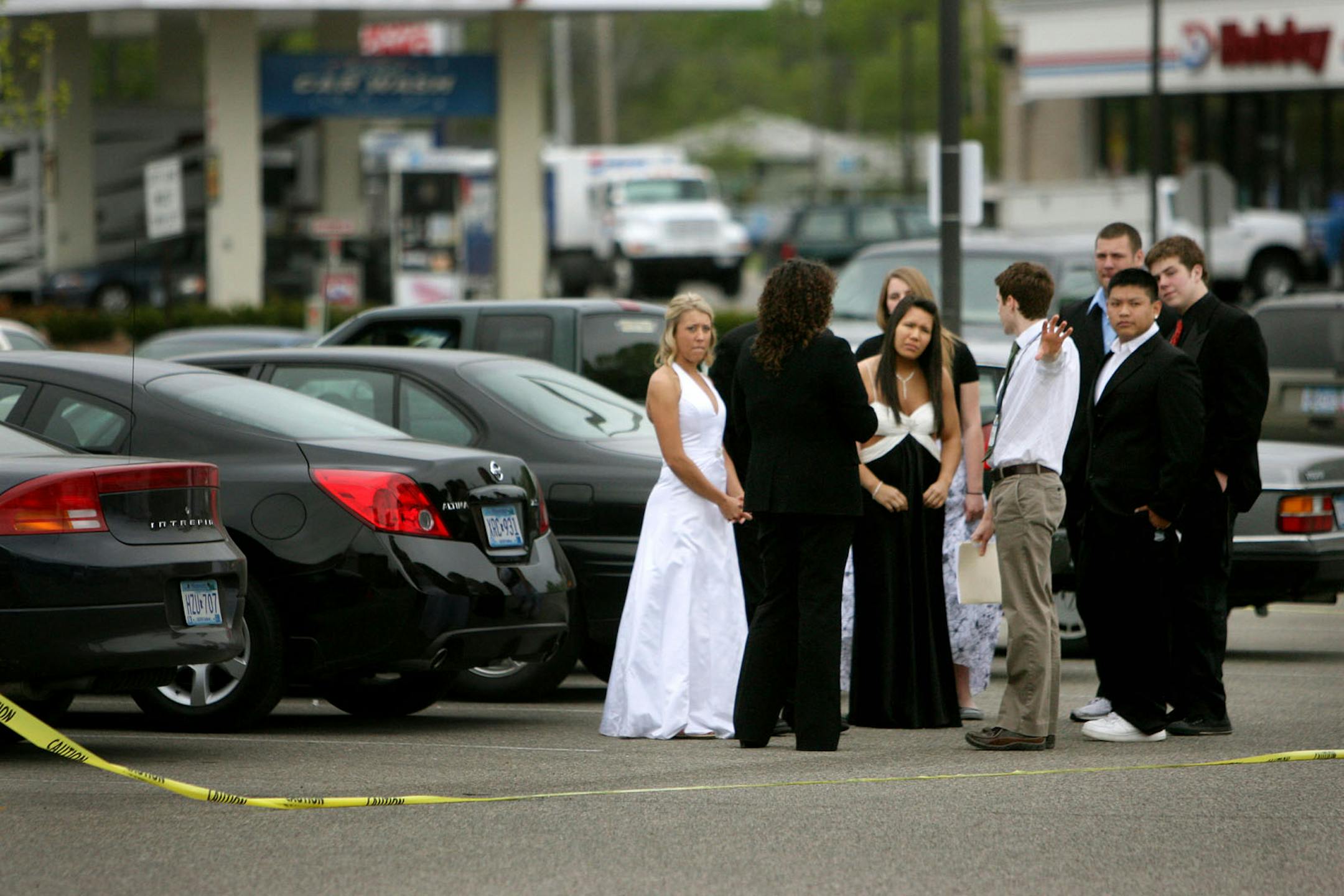 May 19, 2008 - Bloomington, MN - Bloomington Kennedy High School students listened to instructions from their teacher and an employee of the Minnesota Department of Public Safety communications deparment outside their school. The students and local police officers were taking part in a statewide campaign known as "Click It or Ticket." The seat belt enforcement sweep starts Monday, following a rash of deadly crashes over the last month that resulted in 22 vehicle occupant traffic deaths of which