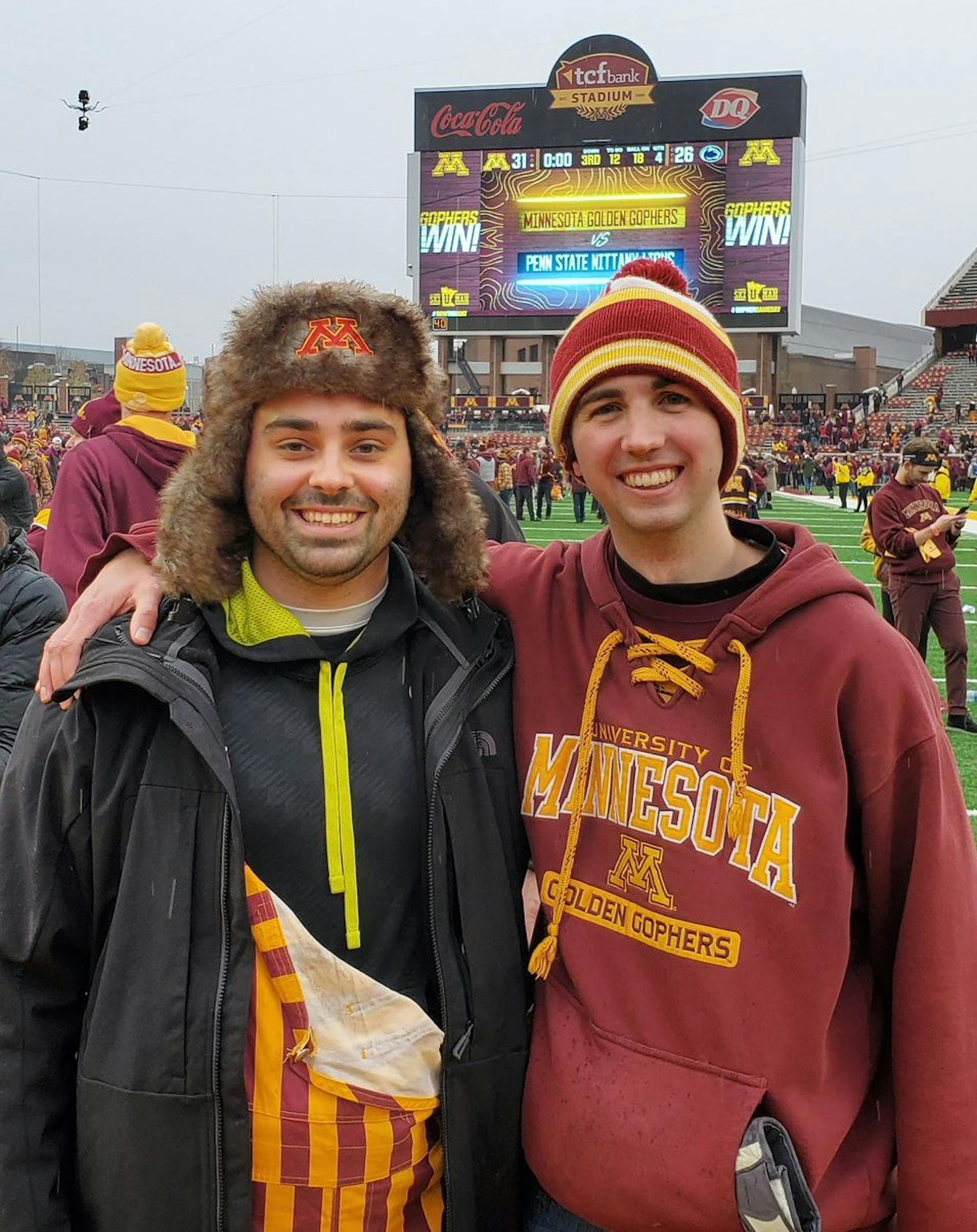 Connor Forbrook (left) with his friend Tom Harless on the right, after the Gophers beat Penn State. Forbrook sold tickets for a different game next weekend so he could travel to see Minnesota play at Iowa. Handout photo from Connor Forbrook
