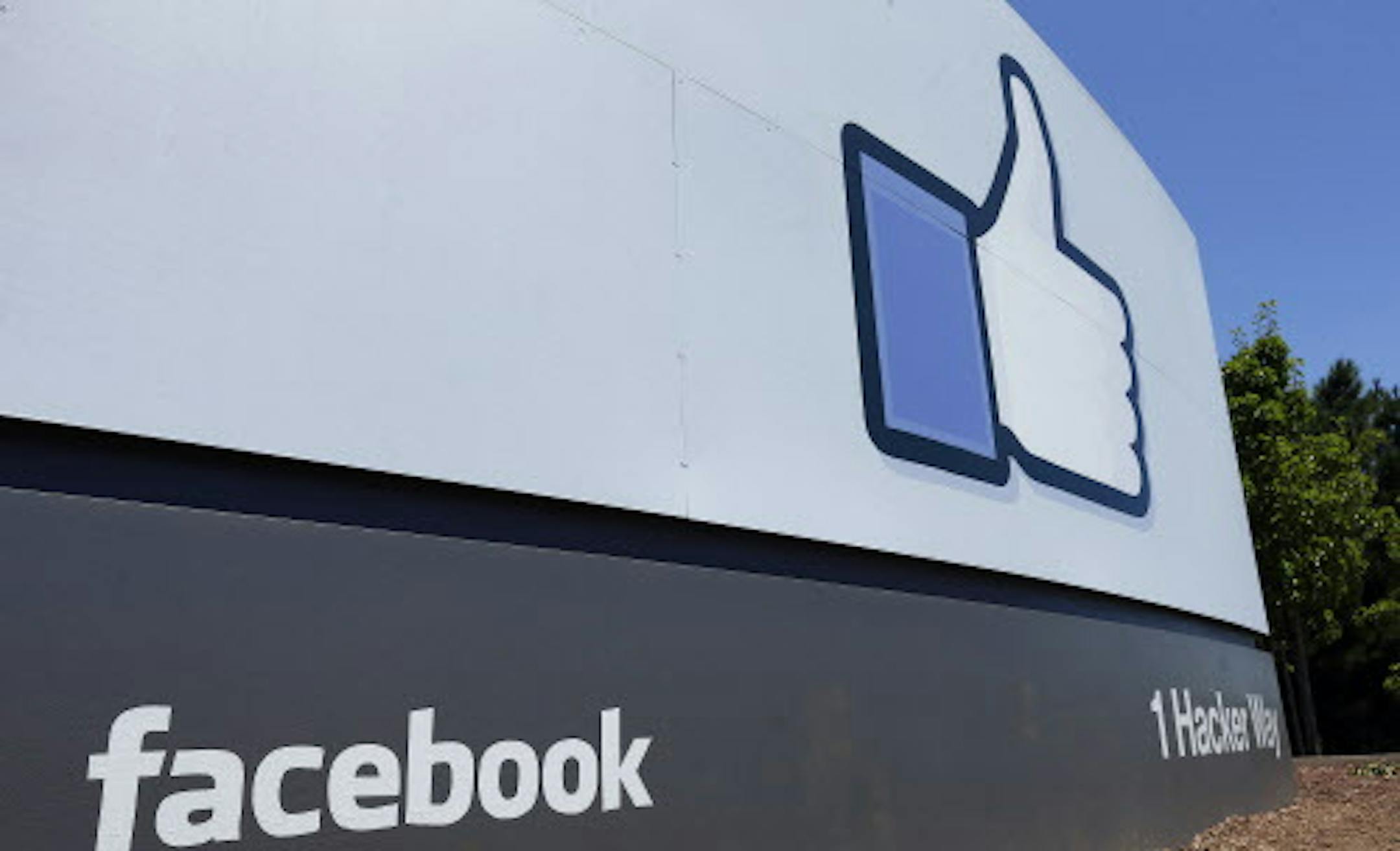 FILE - This Tuesday, July 16, 2013 file photo shows a sign at Facebook headquarters in Menlo Park, Calif. Facebook reports quarterly earnings on Wednesday, April 23, 2014. (AP Photo/Ben Margot, File)