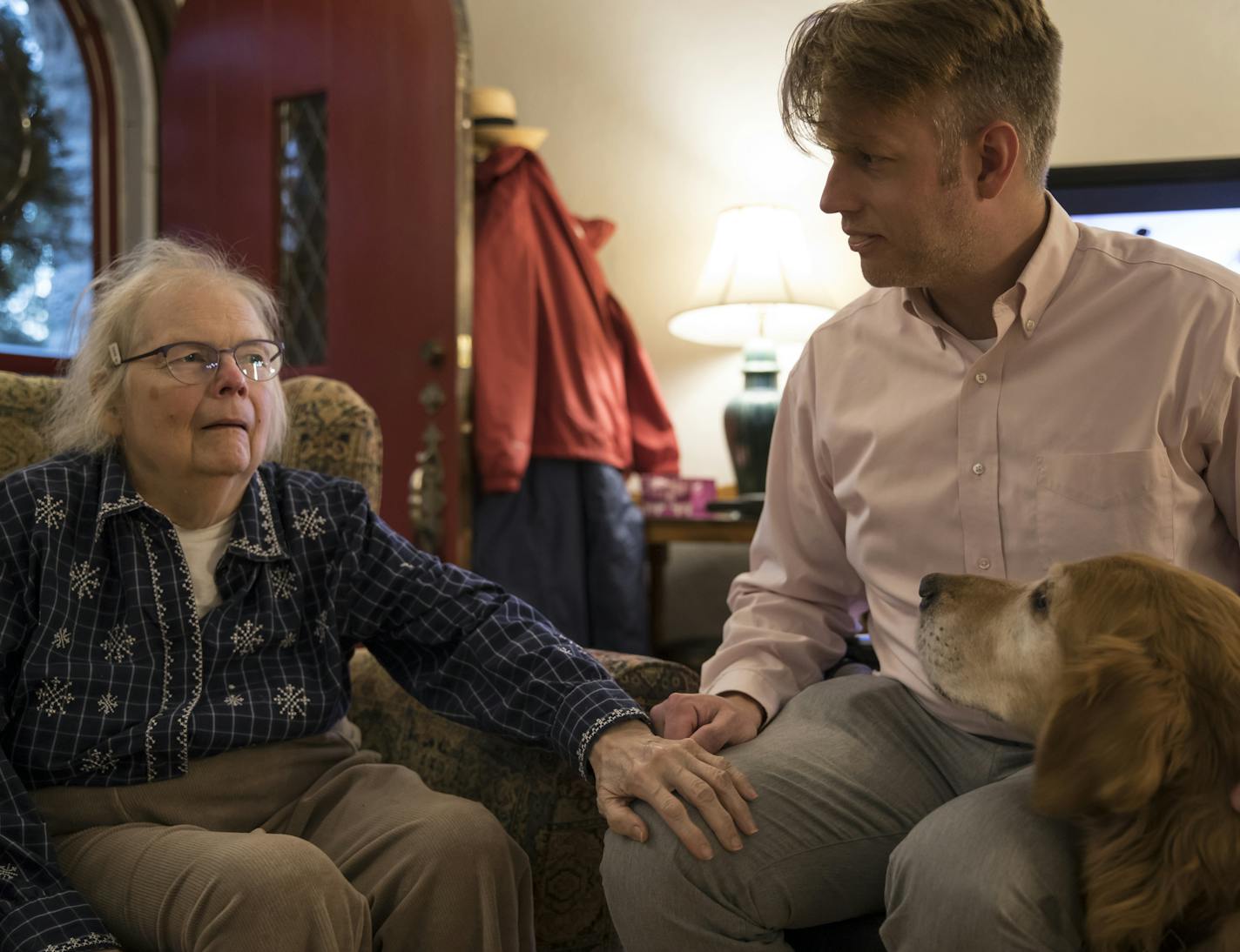 Barbara Fritzberg put her hand on her son Christian's knee as he chatted with her at her home on February 22, 2017. Christian is Barbara's full time caregiver and bought her a home next door to his to be able to care for her at all hours of the day and night. ] RENEE JONES SCHNEIDER &#x2022; renee.jones@startribune.com