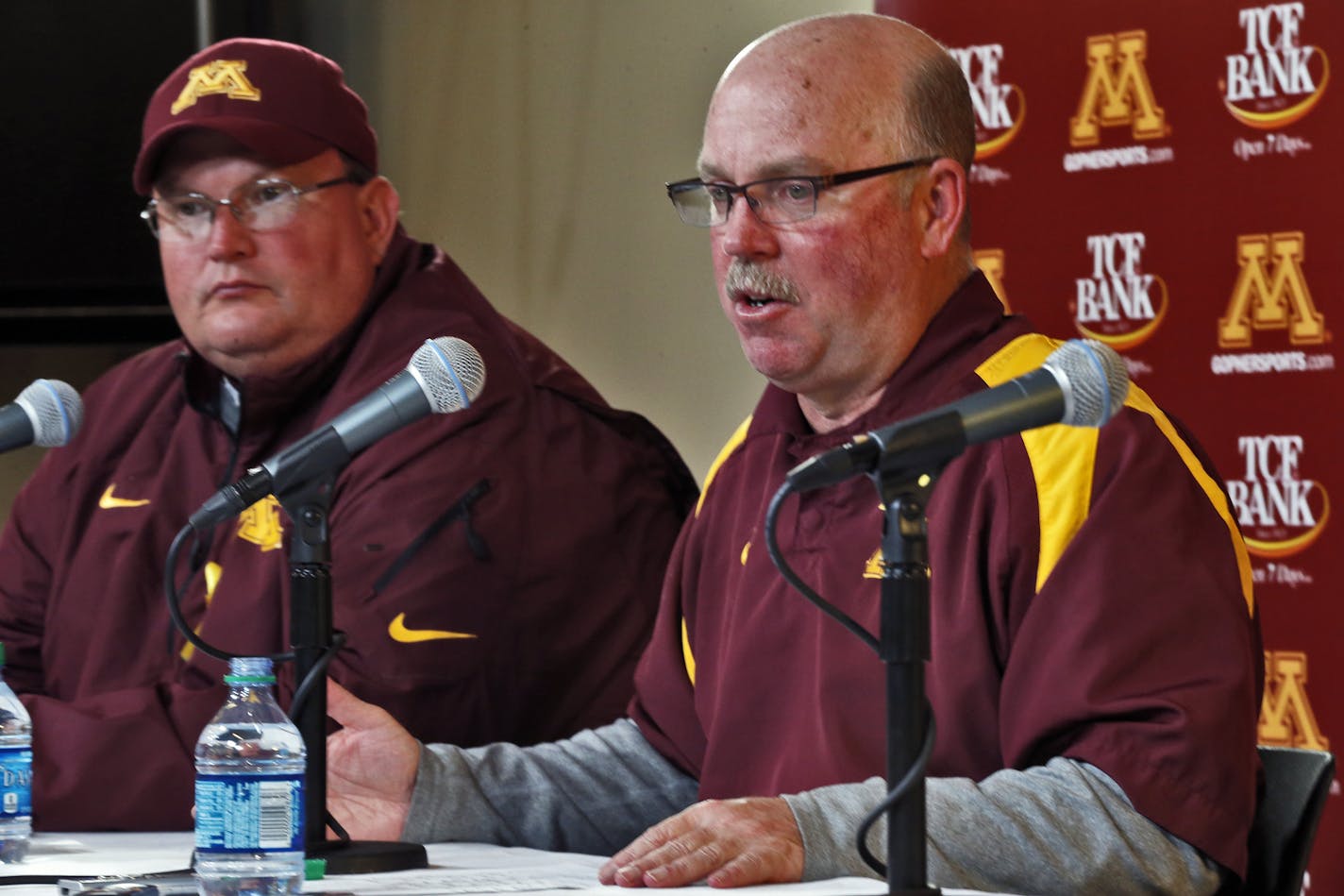 Acting head coach and defensive coordinator Tracy Claeys, left, and head coach Jerry Kill. (MARLIN LEVISON/STARTRIBUNE(mlevison@startribune.com) ORG XMIT: MIN1311111125120787