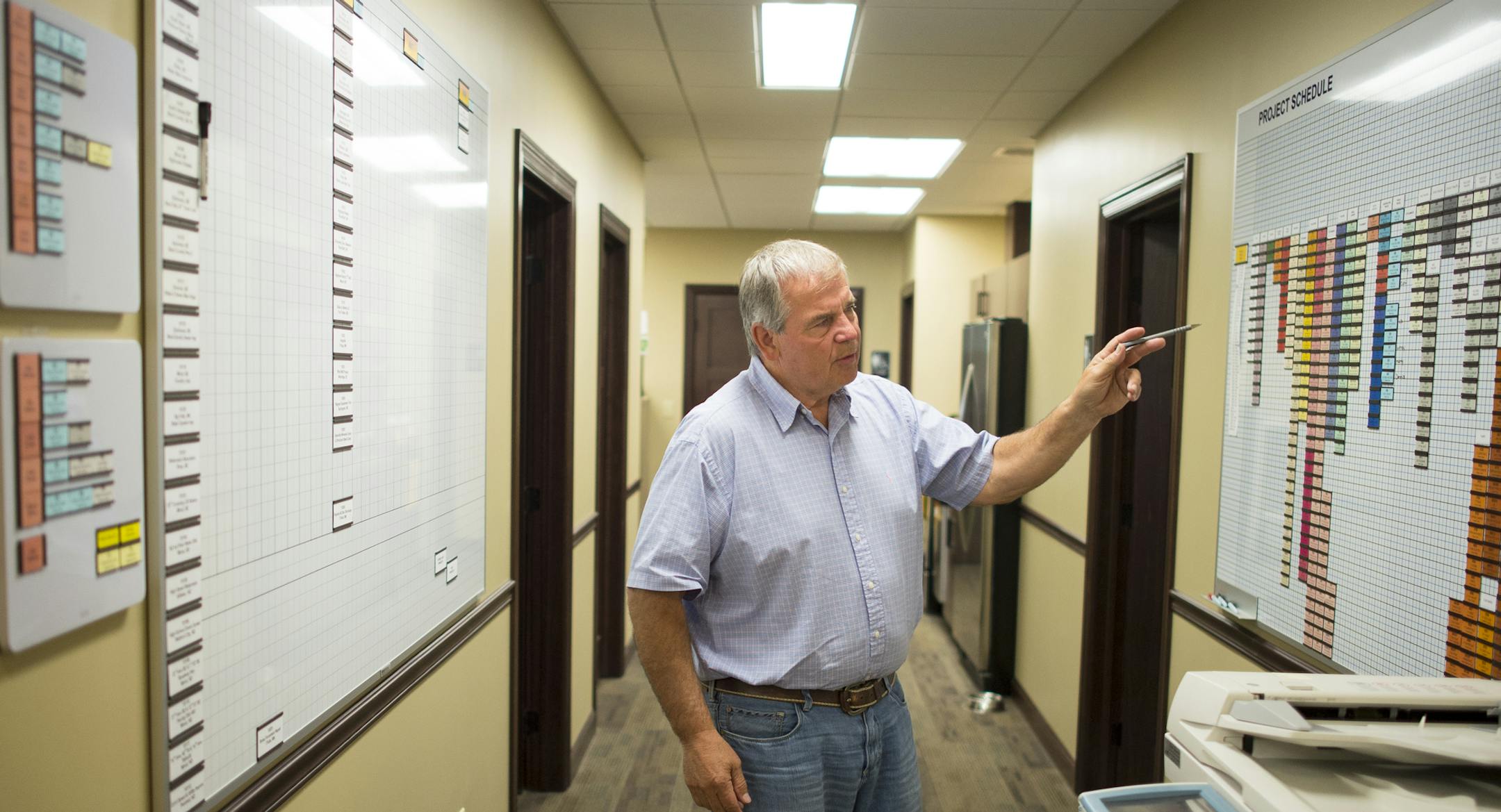 Wagner Construction owner, Dennis Wagner, spoke about some of his current building projects and the equipment assets the company had deployed, while in a hallway of his office in International Falls. ] Aaron Lavinsky • aaron.lavinsky@startribune.com Story on Ranier Mayor and businessman Dennis Wagner.