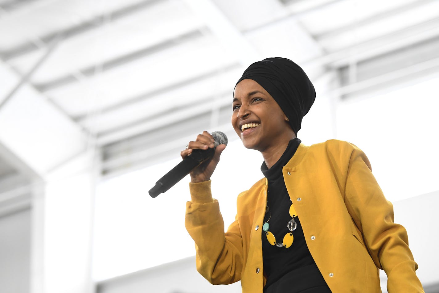 U.S. Rep. Ilhan Omar, D-Minn., spoke at a rally in Springfield, Mass., in February. Omar won the DFL endorsement Sunday to run in the Aug. 11 primary election for her Minneapolis-based congressional seat. She faces at least one challenger.