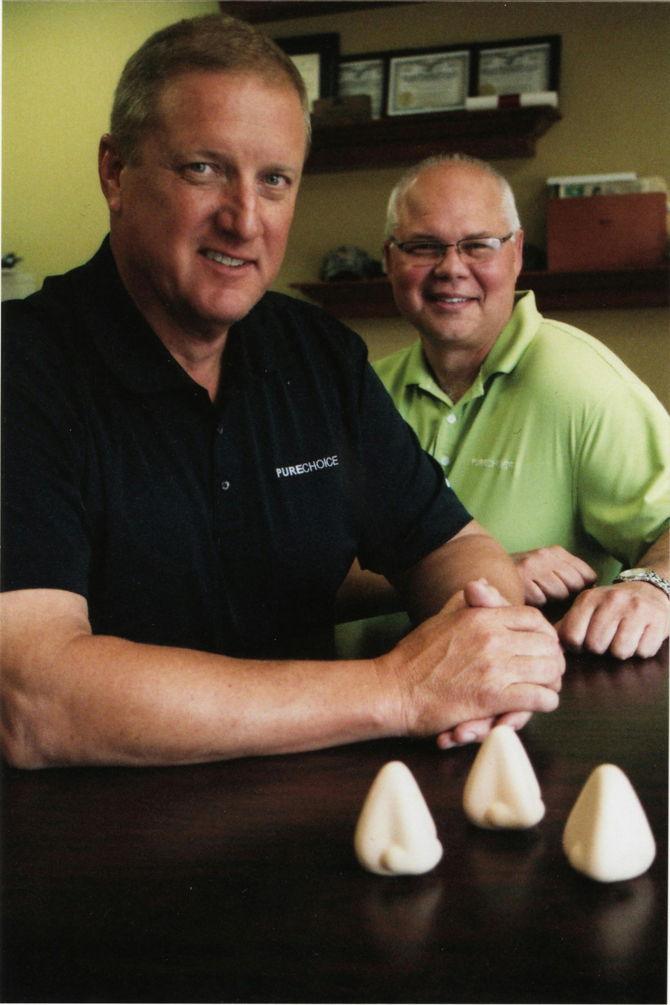 Bryan Reichel(left), founder and CEO, and Kevin Kuhne, president of PureChoice Inc., have seen sales soar with "The Nose," a system that monitors indoor air quality. ORG XMIT: MIN2014091817132080