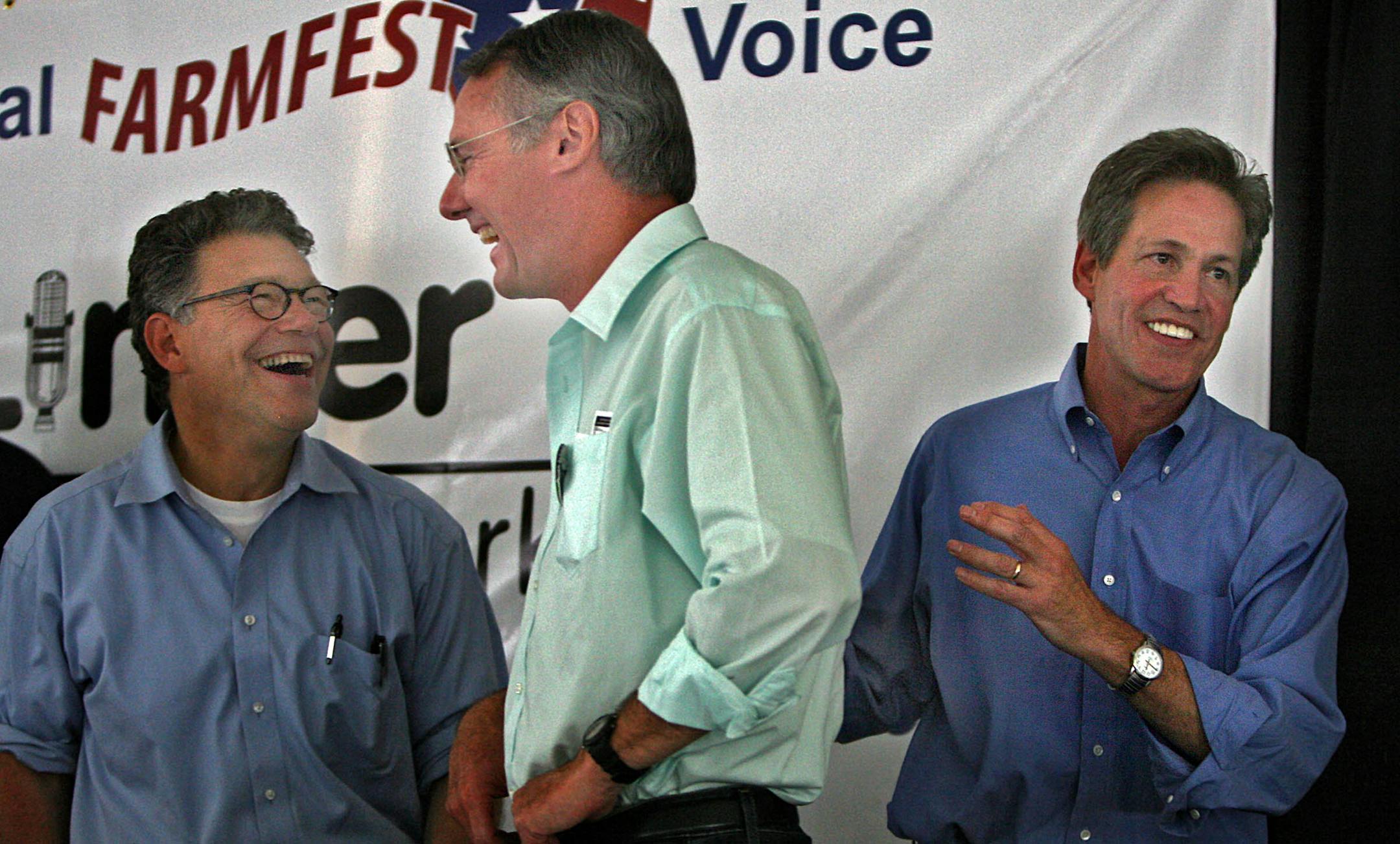 Al Franken, left, Steve Williams and Norm Coleman shared a light moment at the conclusion of a debate between candidates at Farmfest in Morgan, Minn.