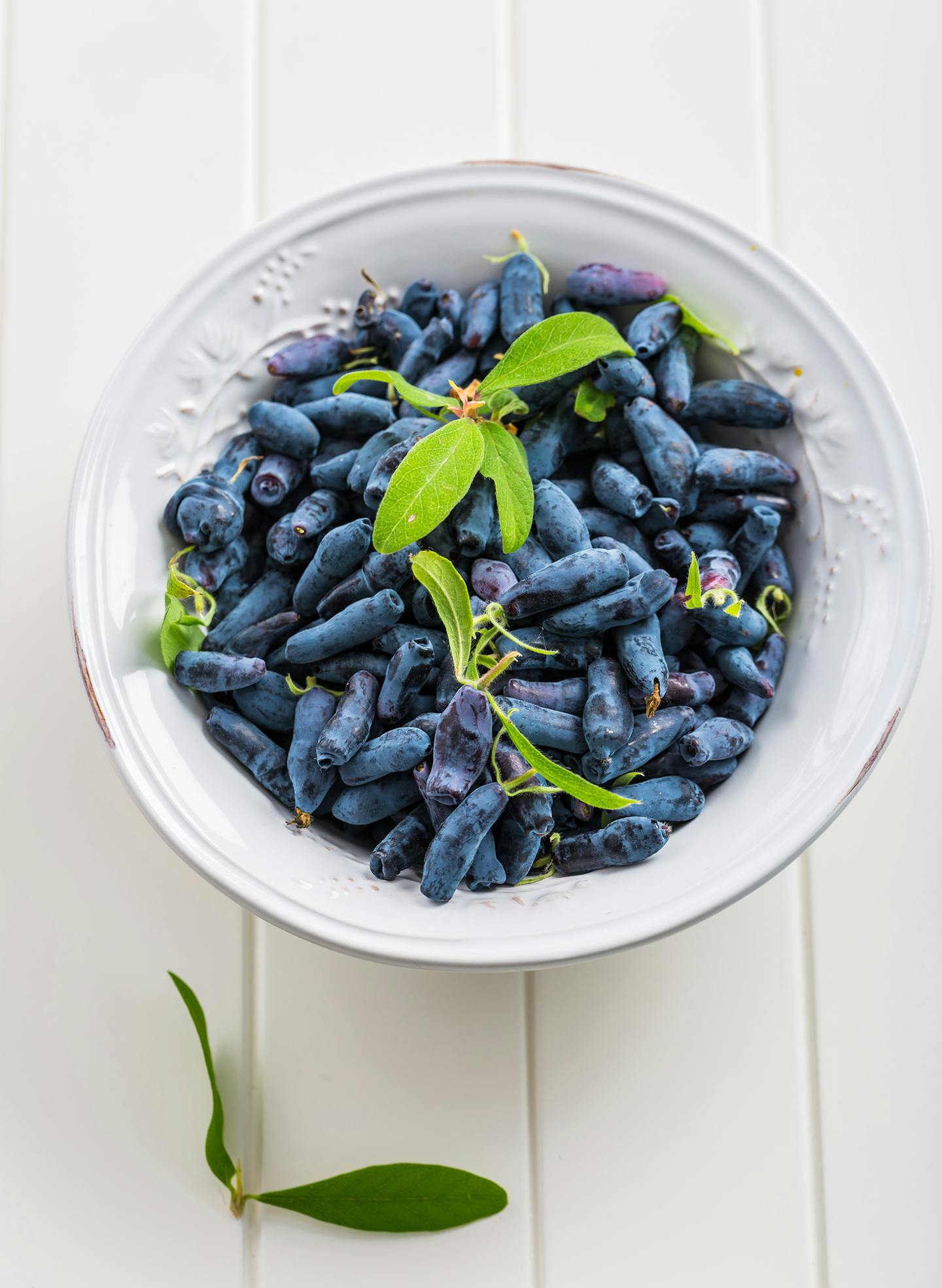 iStock
Delicious and healthy honeyberry (lonicera) in the bowl