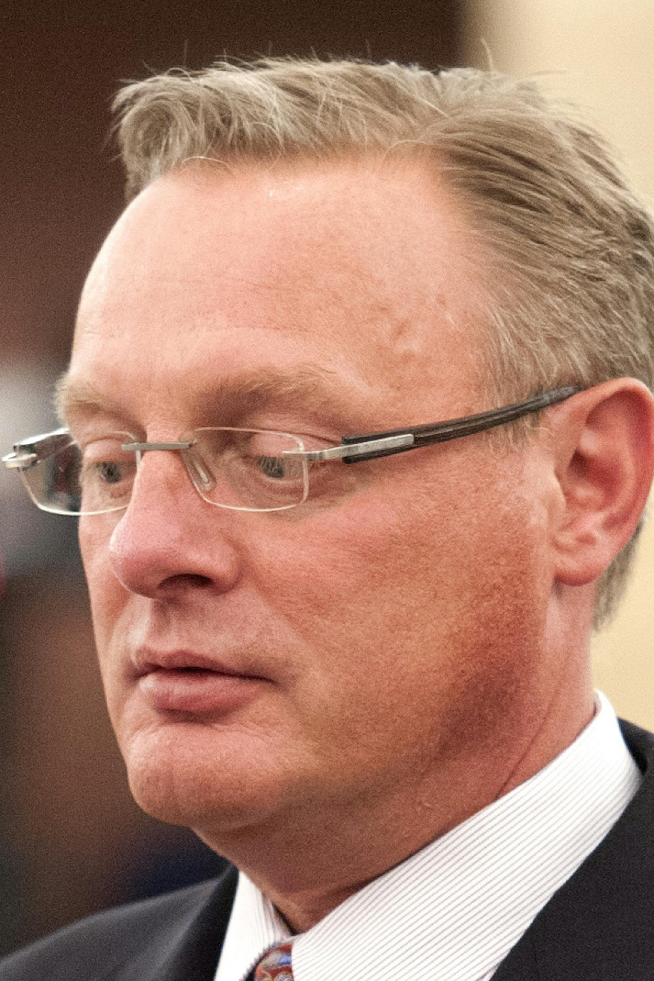 Ramsey County board chairman Rafael Ortega took the opportunity to lobby Metropolitan Sports Facilities Commission Chairman Ted Mondale before the Senate took up the stadium bill Friday, April 20, 2012. ] GLEN STUBBE * gstubbe@startribune.com ORG XMIT: MIN2013042218412821