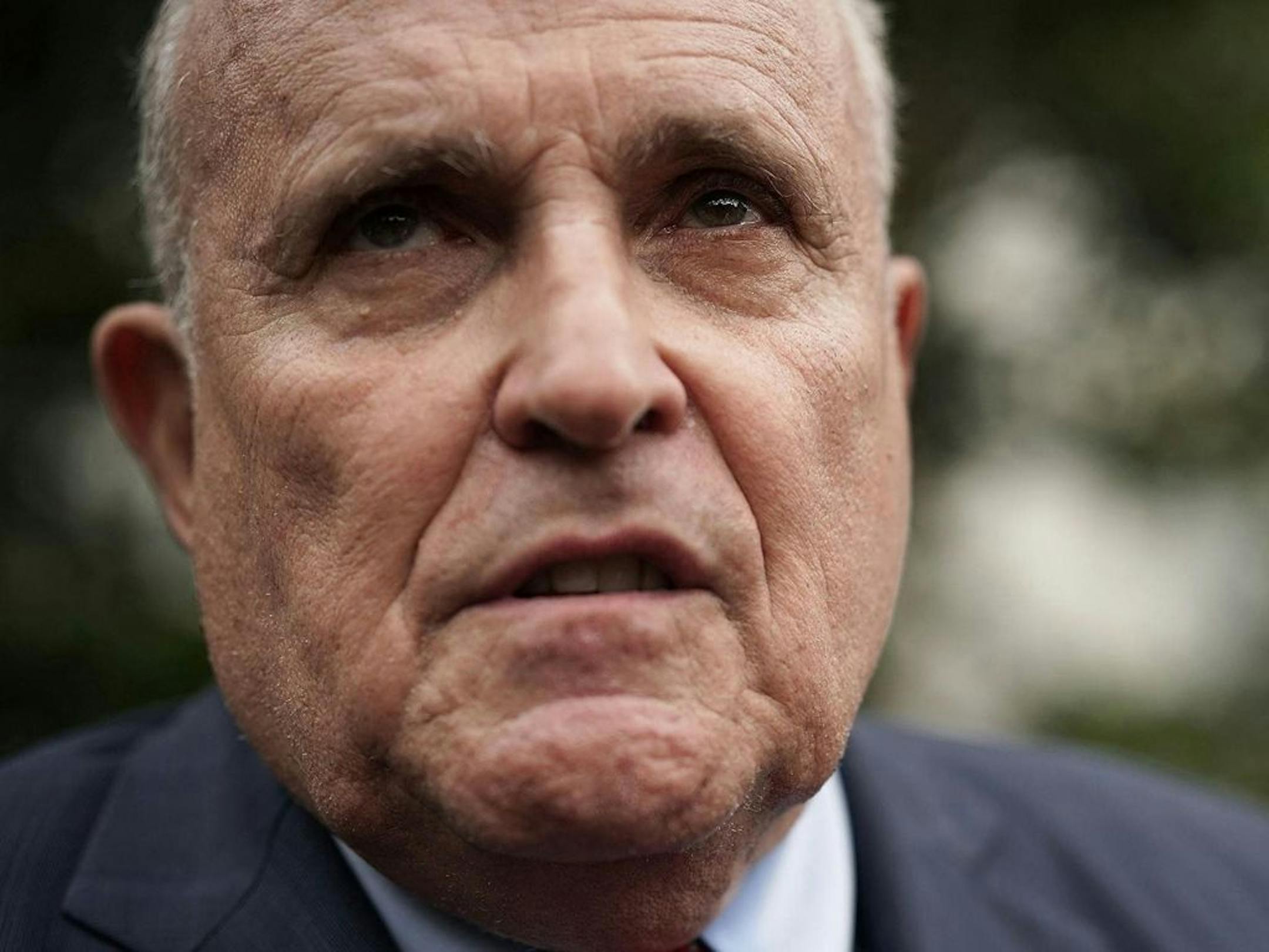 Rudy Giuliani, former New York City mayor and current lawyer for U.S. President Donald Trump, speaks to members of the media during a White House Sports and Fitness Day at the South Lawn of the White House on May 30, 2018 in Washington, D.C.
