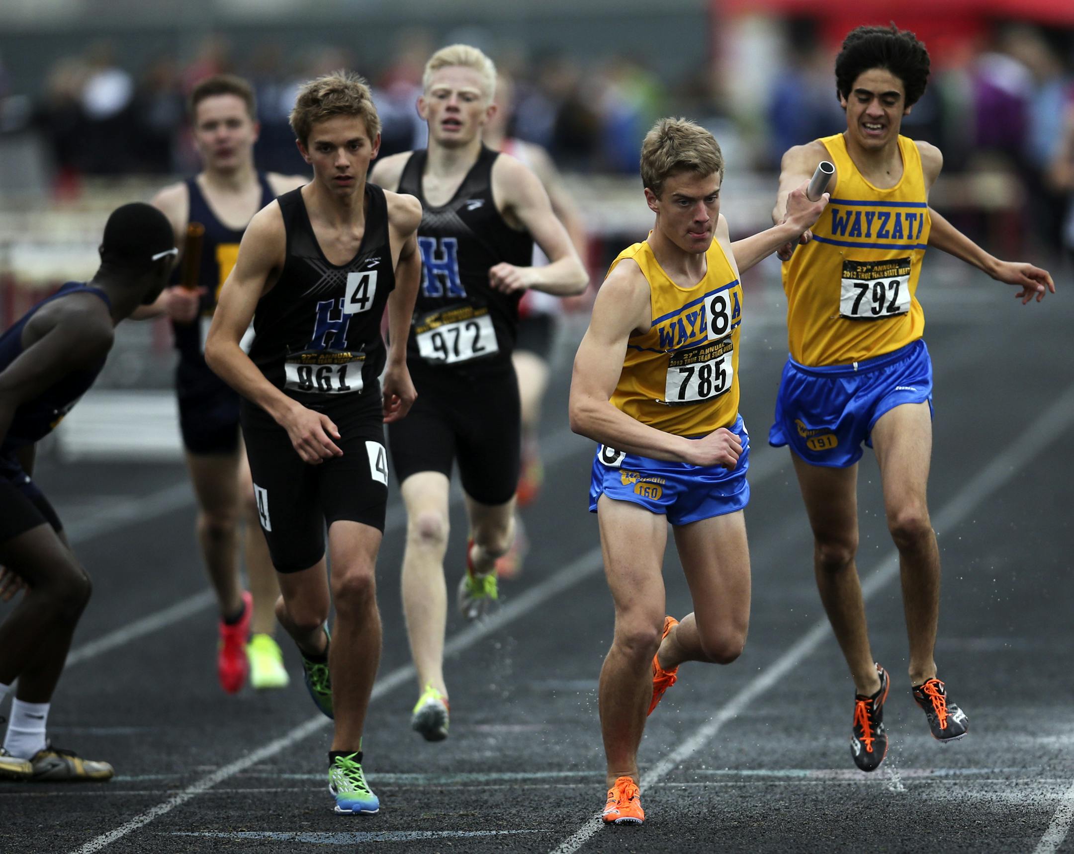 Wayzata&#x2019;s Derek Peterson (785) took the baton from teammate Manuel Santana en route to the best time in the boys&#x2019; 4x800 relay at the Class 3A True Team track meet Friday at Stillwater.