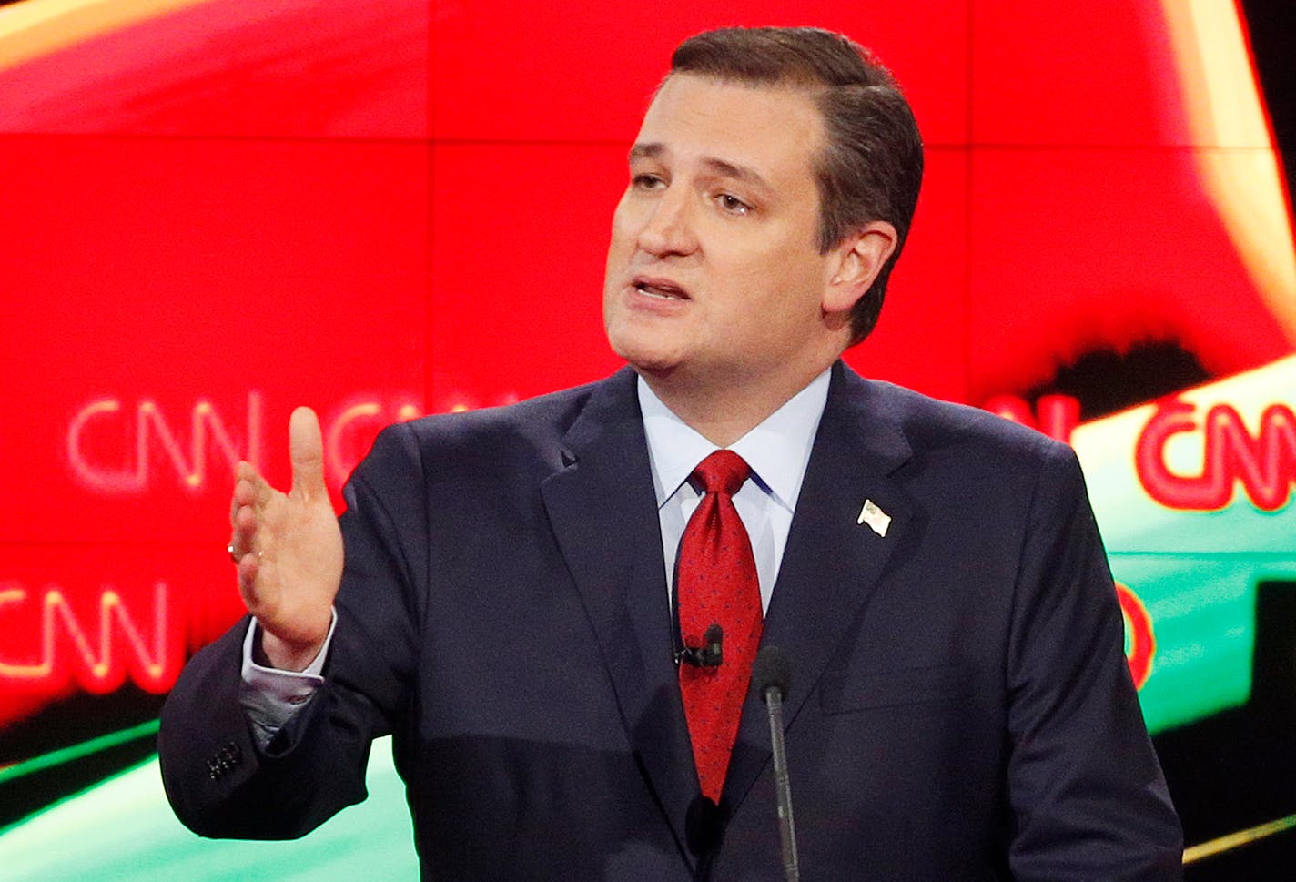 In this Dec. 15, 2015, photo, Ted Cruz makes a point during the CNN Republican presidential debate at the Venetian Hotel & Casino in Las Vegas. If you want to see Ted Cruz in denial about his record and past rhetoric, ask him about immigration.