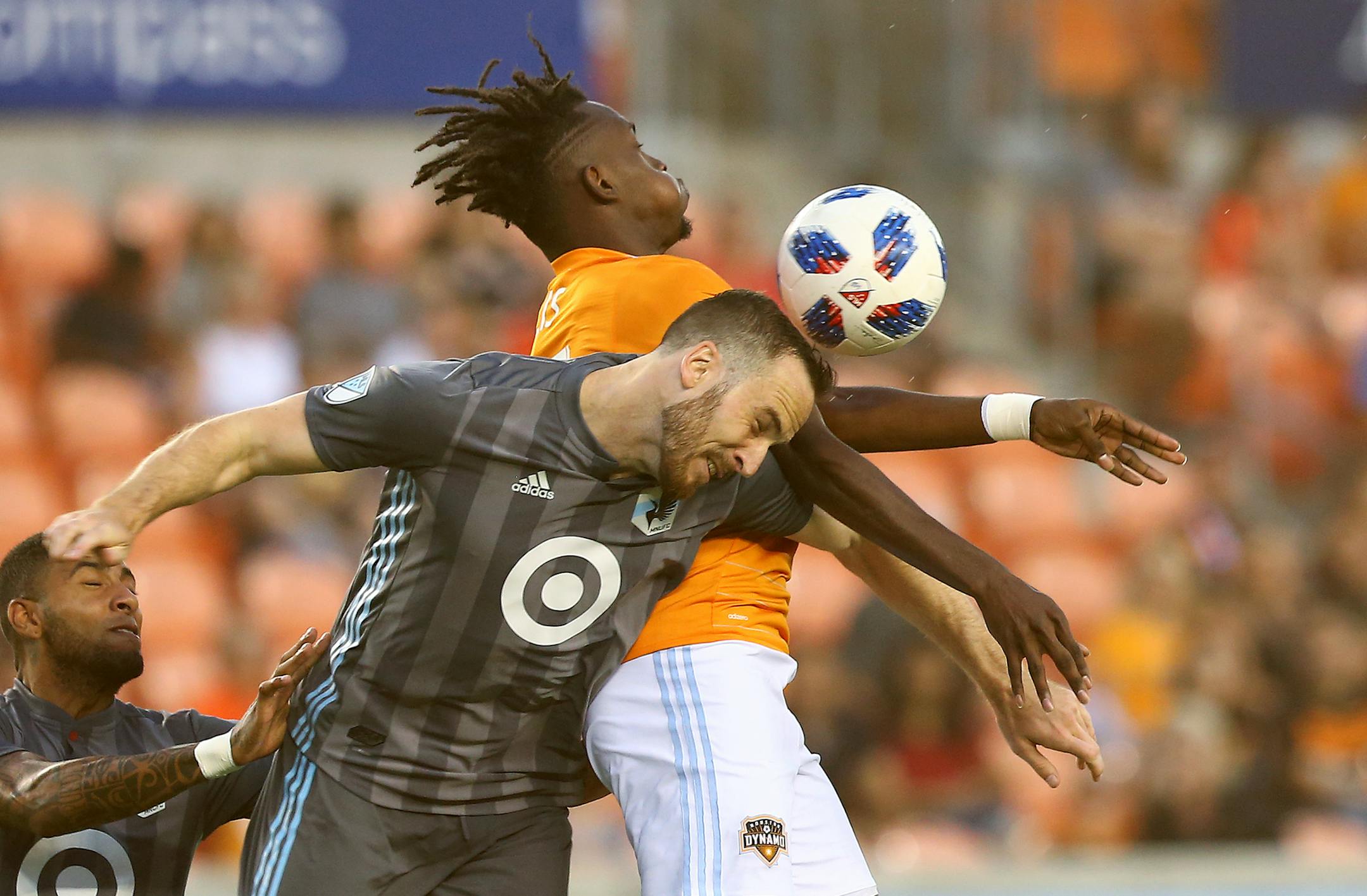 Minnesota United defender Brent Kallman (front), inserted into the starting lineup in the Loons' 2-1 victory at New York Red Bulls, battled Houston Dynamo forward Alberth Elis for a header in a July 2018 game in Houston.