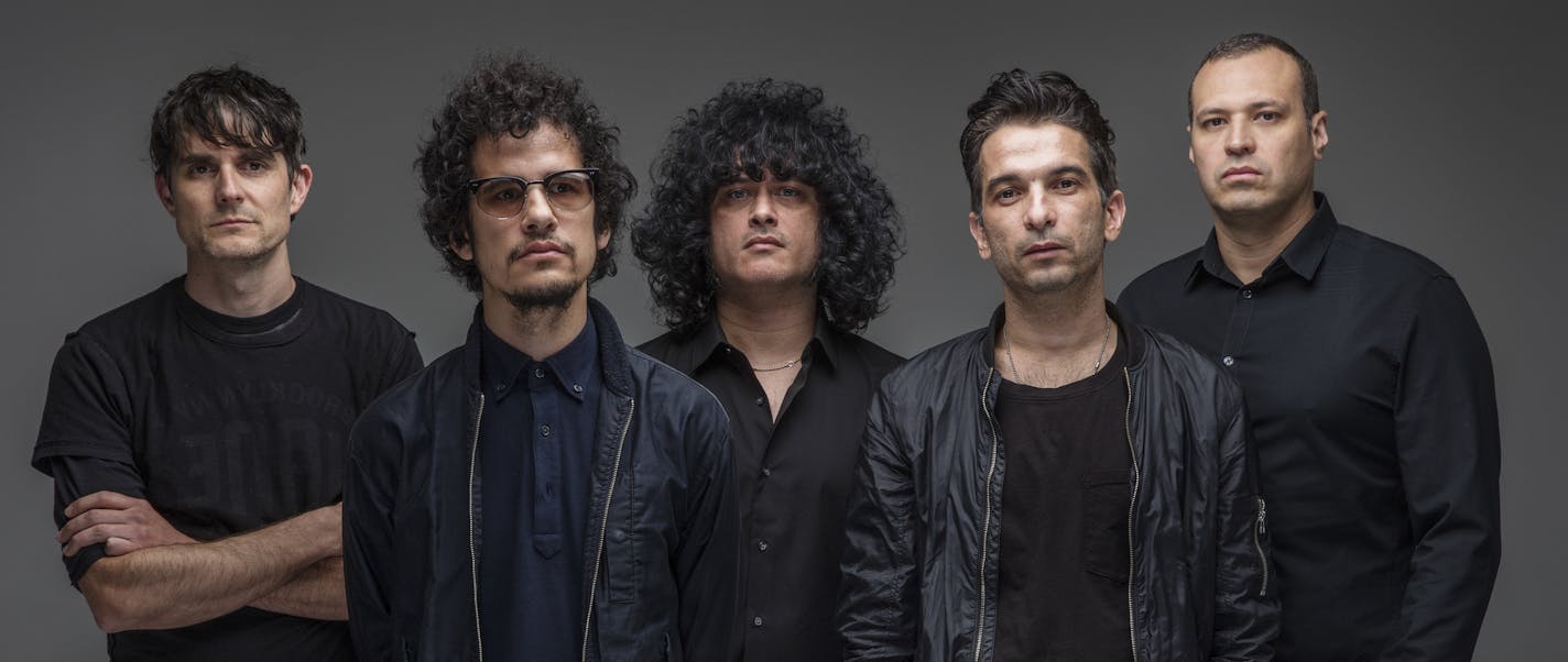 Members of the band At the Drive-In, from left: Keeley Davis, Omar Rodriguez-Lopez, Cedric Bixler-Zavala, Tony Hajjar and Paul Hinojos, in New York, March 21, 2017. The band is putting out its first album, &#x201c;in&#x2022;ter a&#x2022;li&#x2022;a,&#x201d; since 2000, when it released &#x201c;Relationship of Command.&#x201d; (Tony Cenicola/The New York Times)