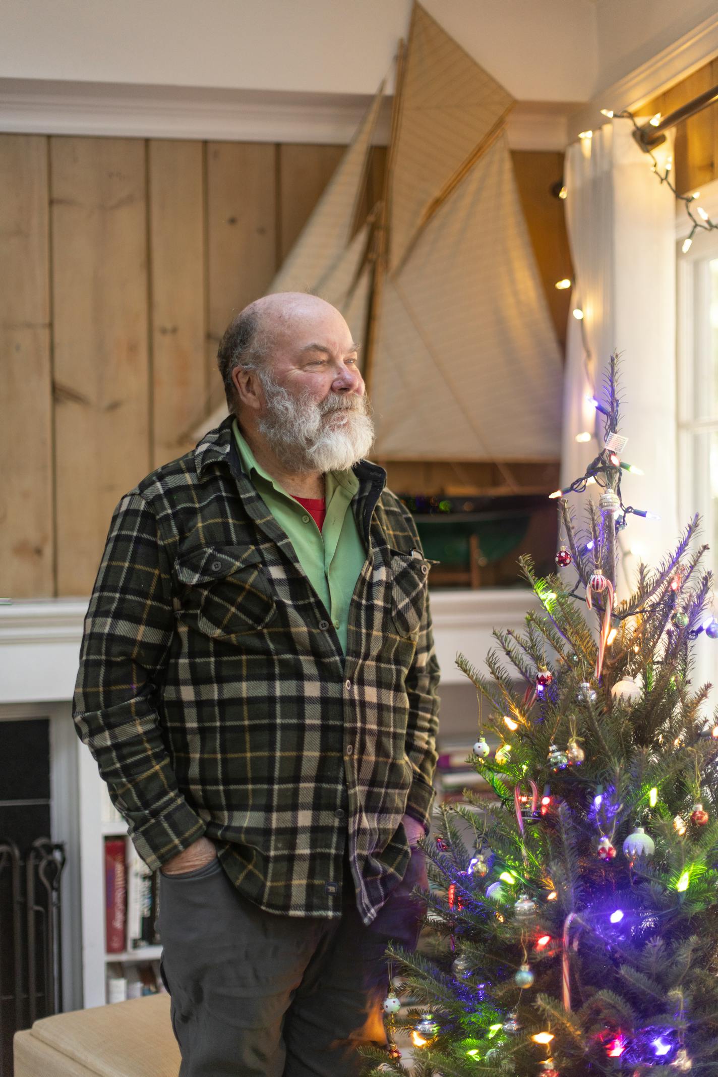 Ken Dorph, a Sag Harbor resident who was hired as a volunteer to wear a Santa Claus costume at an event hosted by the local chamber of commerce, in Sag Harbor, N.Y., on Dec. 13, 2023. Dorph had grown a white beard, but a tense discussion about the Israel-Hamas war at a local synagogue led to complaints that cost him his job. (Lindsay Morris/The New York Times)