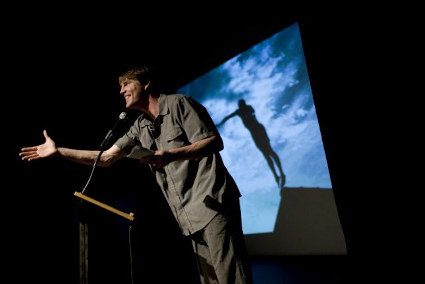 Tyson Lien gives a presentation on "The Emerging Future" at the first Minneapolis Pecha Kucha event held at Intermedia Arts in April.