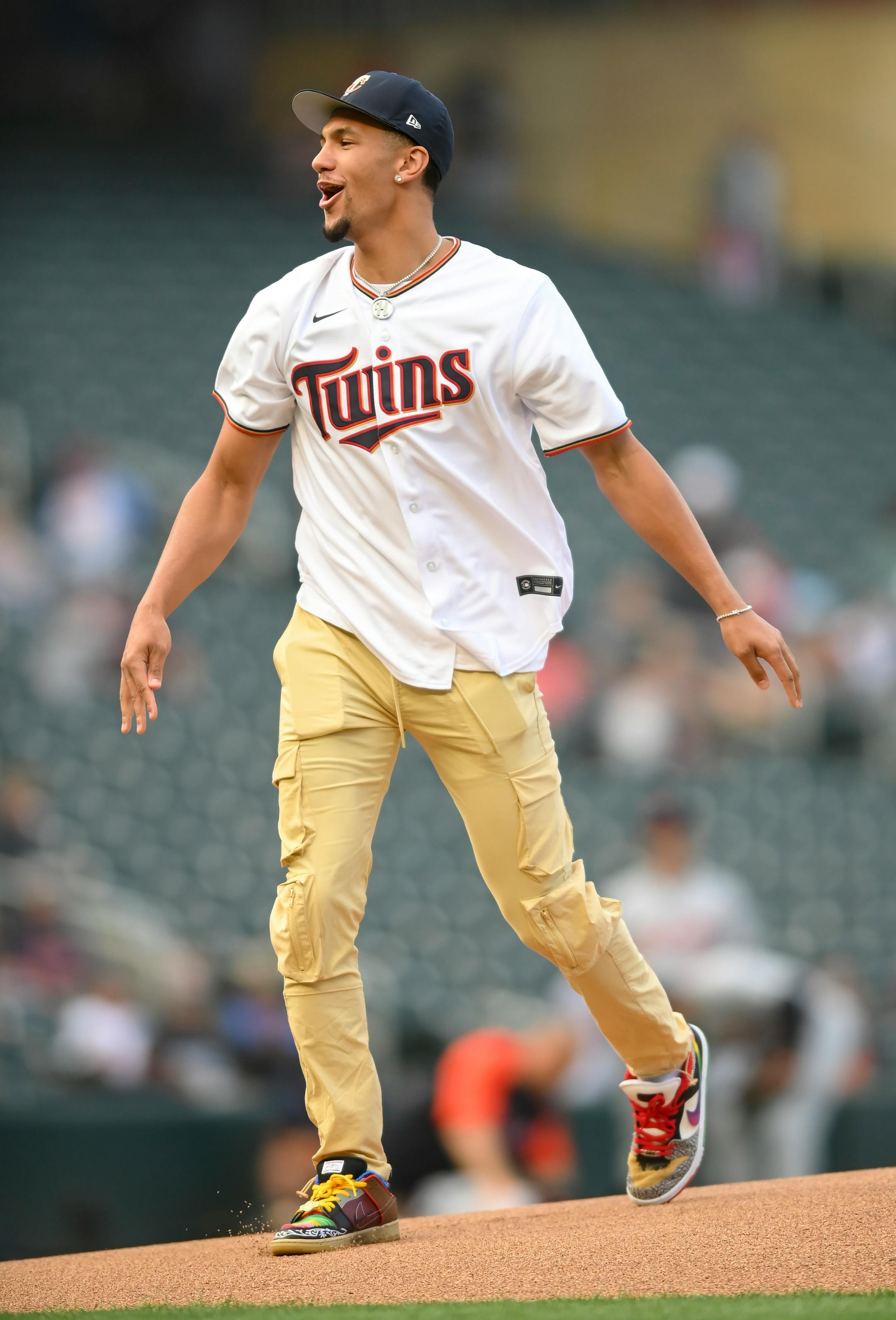 Gonzaga star basketball player and former Minnehaha Academy star Jalen Suggs reacted after he threw the ceremonial first pitch Thursday night.
