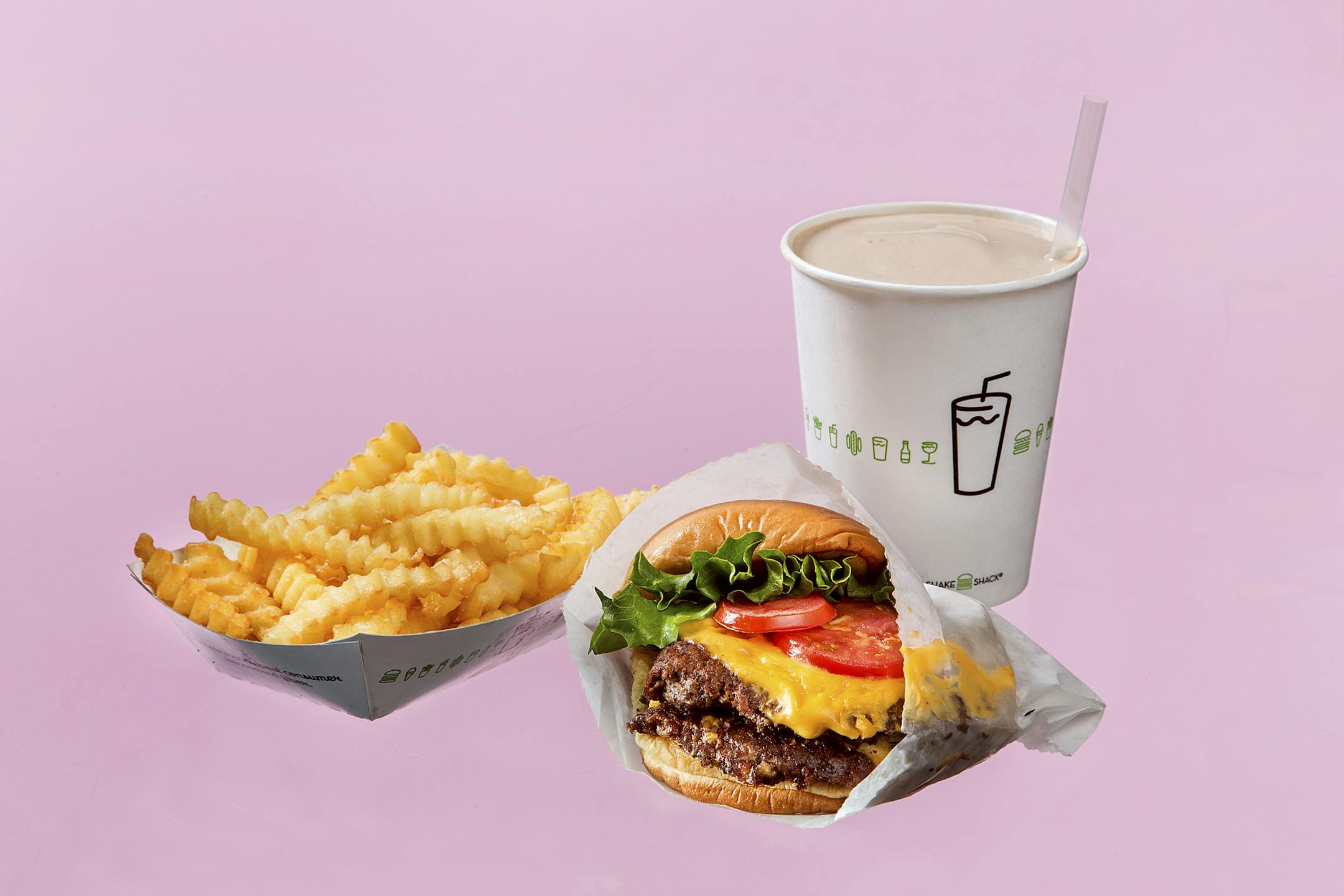 FILE ó A double ShackBurger with fries and Black and White shake from Shake Shack in New York, Dec. 12, 2104. The company, which began as a hot dog stand and has grown to 31 locations, filed to sell shares to the public on the New York Stock Exchange on Monday. (Tony Cenicola/The New York Times) ORG XMIT: XNYT109