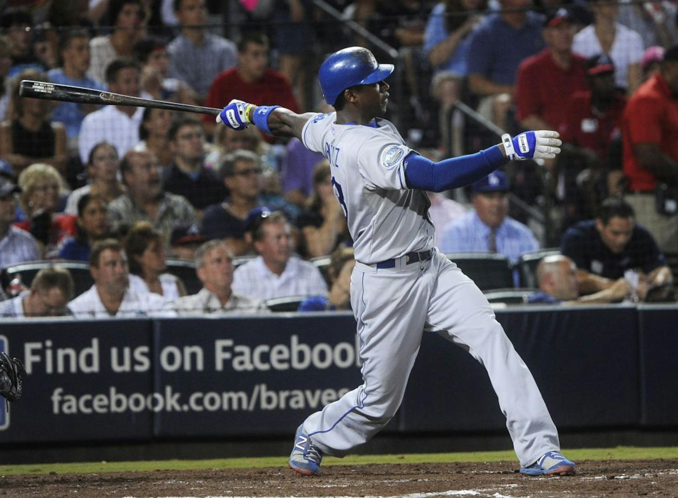 Hanley Ramirez follows through on a three-run home run to left against the Braves last summer