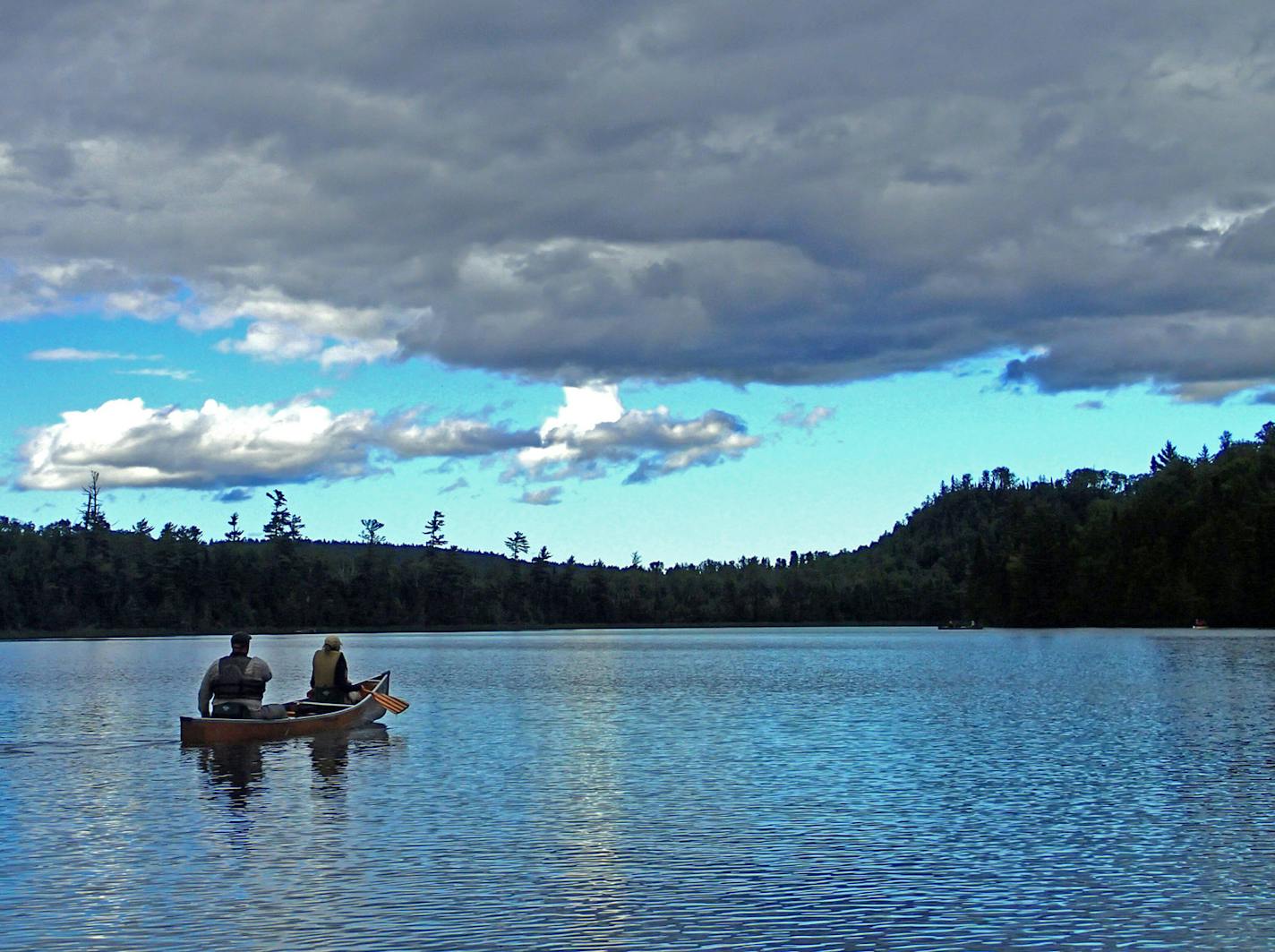 John and Jodi Weyrauch of Stillwater paddled on Moon Lake in the Boundary Waters Canoe Area Wilderness. They had portaged from East Bearskin Lake for a day of fishing. ORG XMIT: MIN1407171402291808