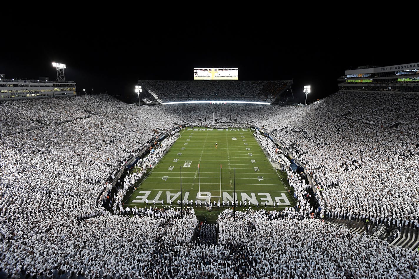 Penn State gets ready to take the field for their NCAA college football game against Minnesota amidst a "Whiteout" crowd at Beaver Stadium, Saturday, Oct. 22, 2022, in State College, Pa. (AP Photo/Barry Reeger)