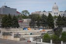 Tents were set up on cement stairs between the History Center and Catholic Charities and in the shadow of the State Capitol in St. Paul on March