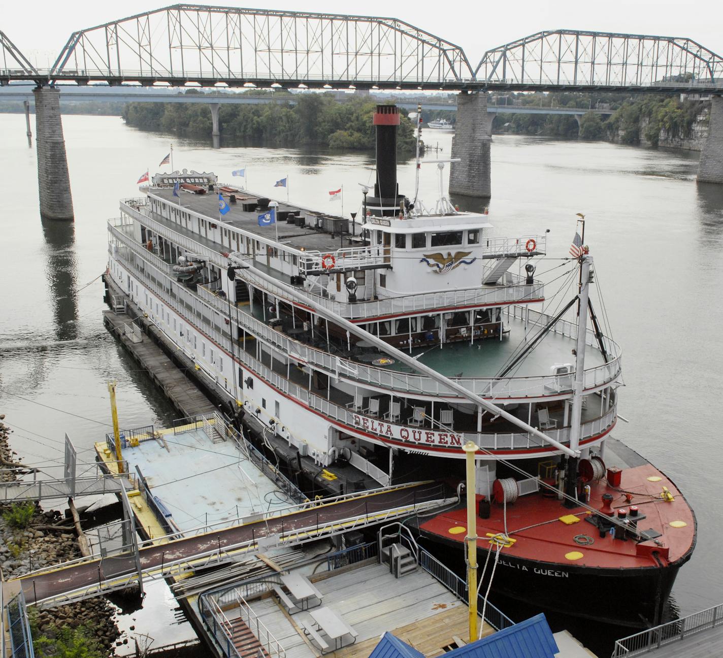 FILE - In this Sept. 25, 2013, file photo, the Delta Queen riverboat is moored at Coolidge Park on in downtown Chattanooga, Tenn. The U.S. House on Tuesday, Nov. 218, 2018, approved a bill that will allow the Delta Queen to cruise the nation's rivers once again after a 10-year layoff. President Donald Trump must still sign the bill. (John Rawlston/Chattanooga Times Free Press via AP, File)