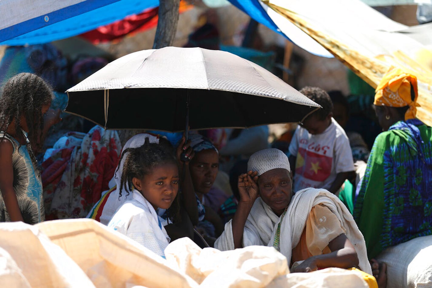 Refugees from the Tigray region of Ethiopia wait to register at the UNCHR center at Hamdayet, Sudan on Saturday, Nov. 14, 2020.