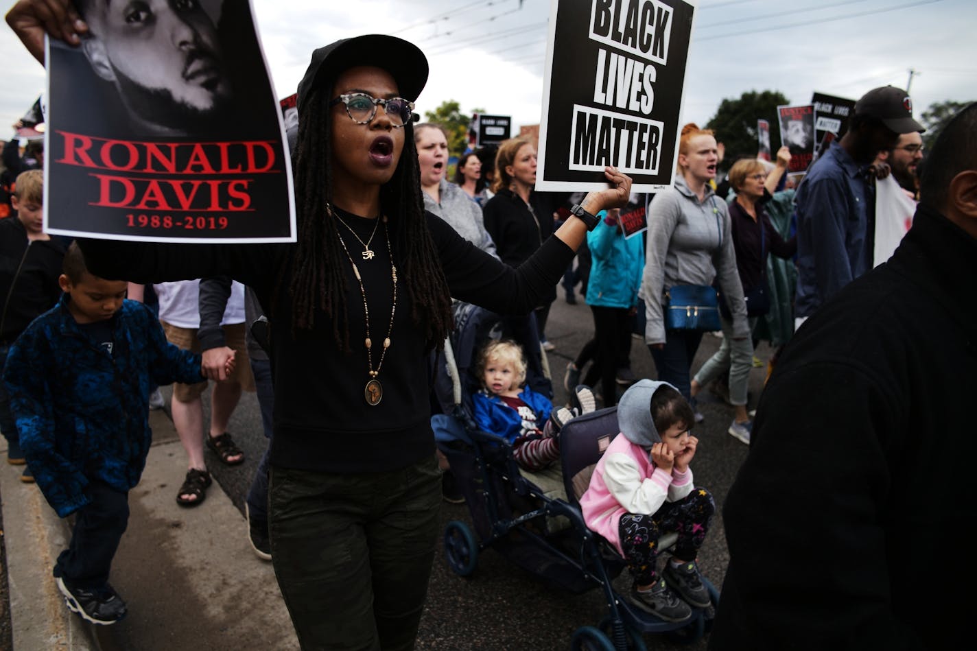 Protesters made their way from the Western District police headquarters to the site of Ronald Davis' fatal shooting by St. Paul police on Sunday, Sept. 22.