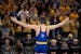 Jarrett Wadsen of St. Michael-Albertville celebrated his win by a fall over Creed Peterson of Hastings during the 3A team finals.
