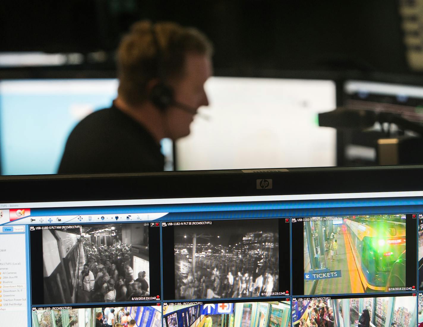 Luke Bryan concert goers waited in line outside US Bank Stadium to board a light rail train after the concert, as seen through a security camera monitor in the Metro Transit Rail Control Center Friday night. ] (AARON LAVINSKY/STAR TRIBUNE) aaron.lavinsky@startribune.com When events at US Bank Stadium and other large venues end, Metro Transit has the daunting task of shuttling thousands fans who use light-rail trains home. The Star Tribune gets a behind-the-scenes look at how that happens in a vi