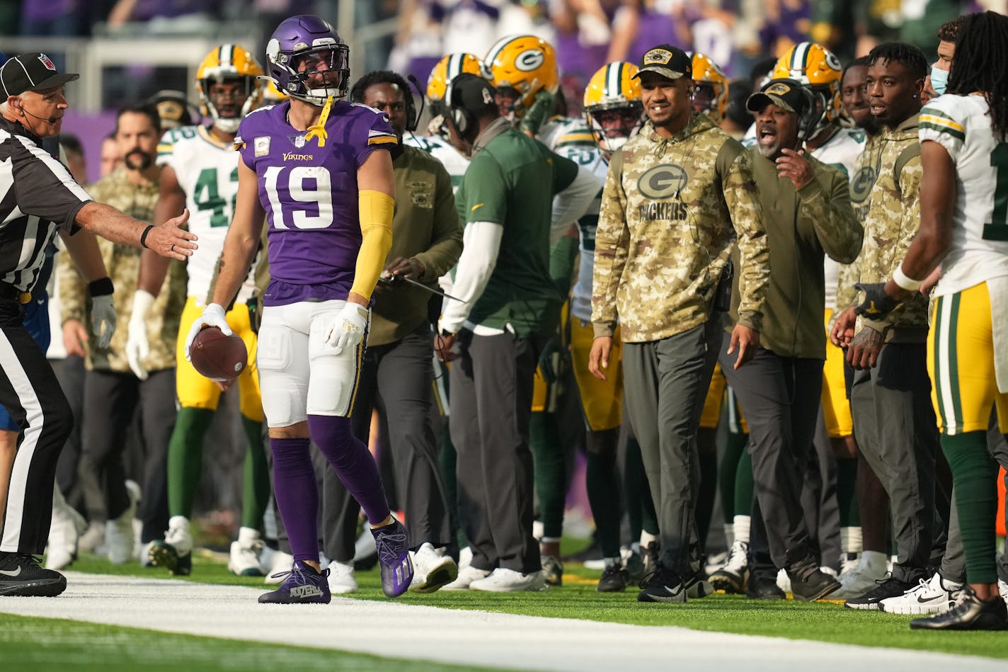 Minnesota Vikings wide receiver Adam Thielen (19) mocked members of the Green Bay Packers on their sidelines after being forced out with the ball in the first quarter of an NFL game between the Minnesota Vikings and the Green Bay Packers Sunday, Nov. 21, 2021 at U.S. Bank Stadium in Minneapolis. ] ANTHONY SOUFFLE • anthony.souffle@startribune.com