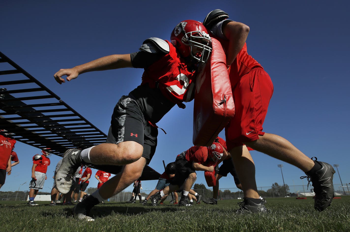 Elk River linemen worked on blocking during Wednesday practice. They're doing a good job so far in a wing-T offense as their team is 5-0 and ranked No. 1 in Class 5A.