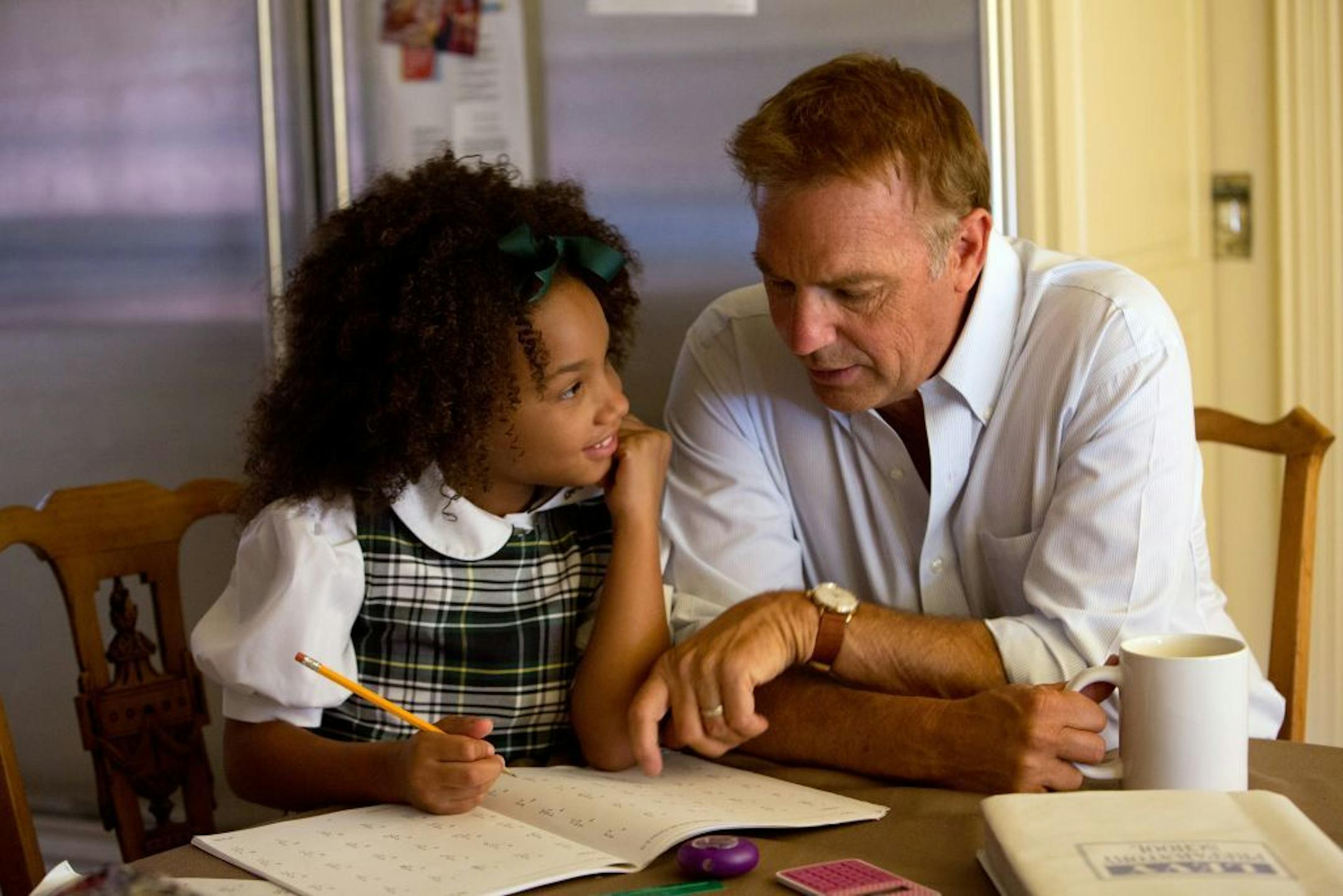 This photo released by Relativity Media shows Jillian Estell, left, and Kevin Costner, in a scene from Relativity Media's "Black or White."