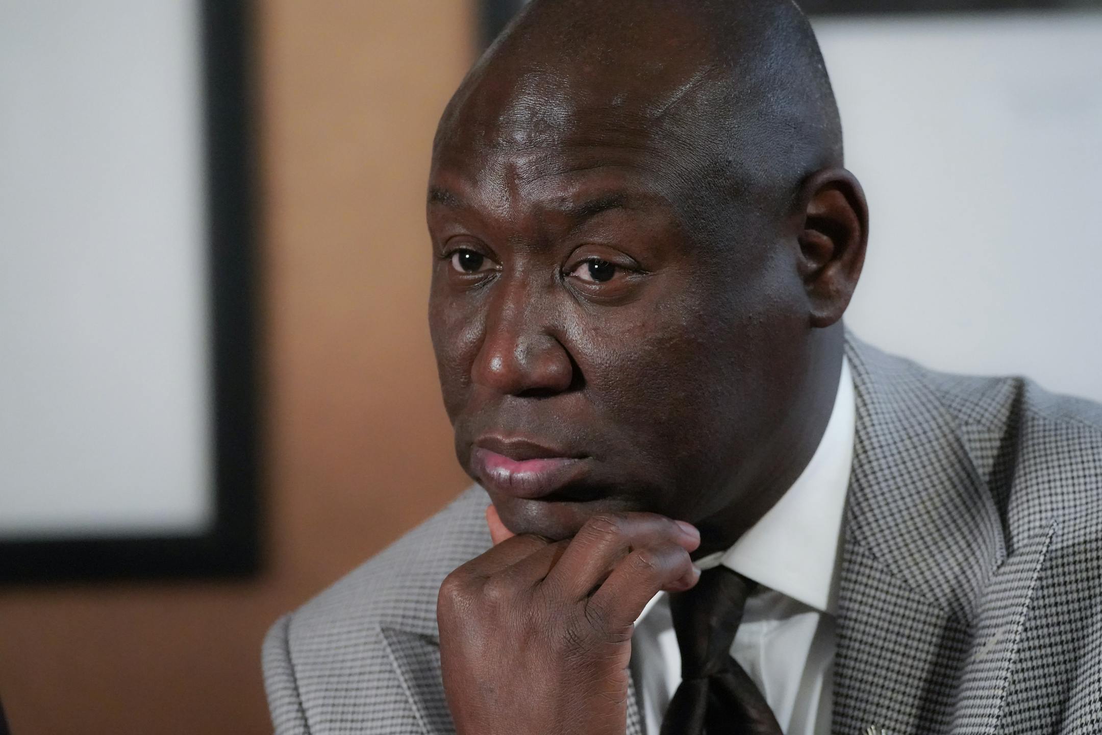 Attorney Ben Crump listens during a private interview.