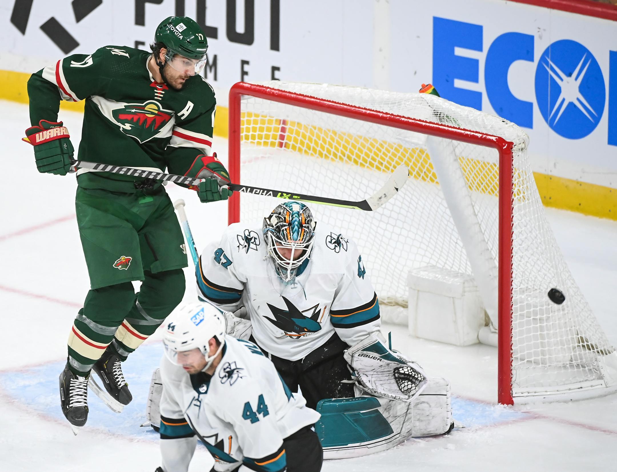Minnesota Wild left wing Marcus Foligno (17) hops to try to redirect a shot as San Jose Sharks goaltender James Reimer (47) makes the save in the third period Tuesday, Nov. 16, 2021 at the Xcel Energy Center in St. Paul, Minn. ] AARON LAVINSKY • aaron.lavinsky@startribune.com