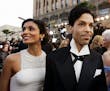 In this Feb. 27, 2005 file photo, singer Prince arrives with his wife Manuela Testolini for the 77th Academy Awards in Los Angeles.