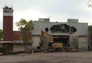 The Terrace Theatre was partly demolished Saturday morning before a court order brought a halt to the process.