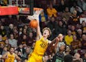 Minnesota Golden Gophers center Treyton Thompson (42) slammed a missed shot to seal the 58-55 win over the Chicago State Cougars.