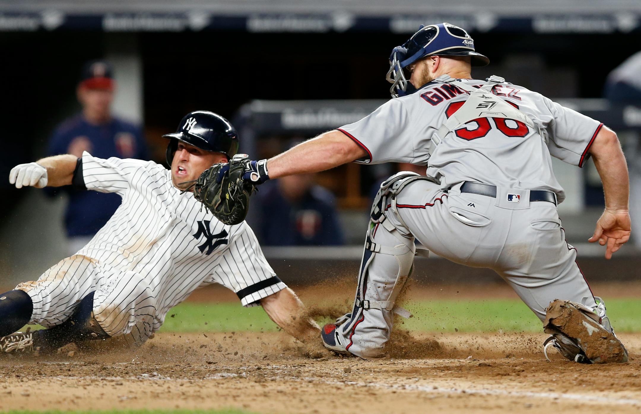 The Yankees' Brett Gardner reacted after he was tagged out at the plate by Twins catcher Chris Gimenez during the seventh inning of New York's 5-2 victory Tuesday night.