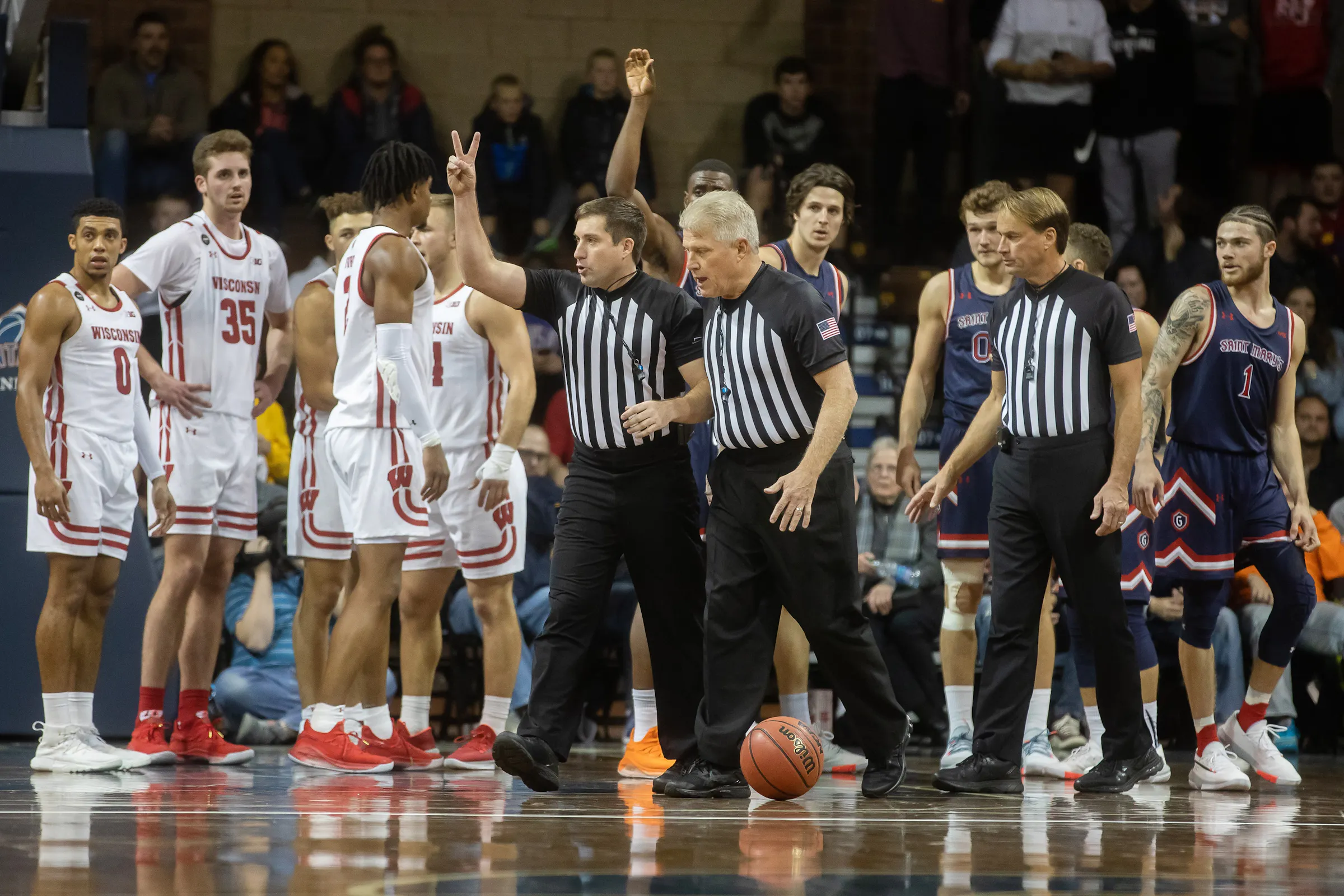 Traveling — on the road and on the court — with college basketball referees
