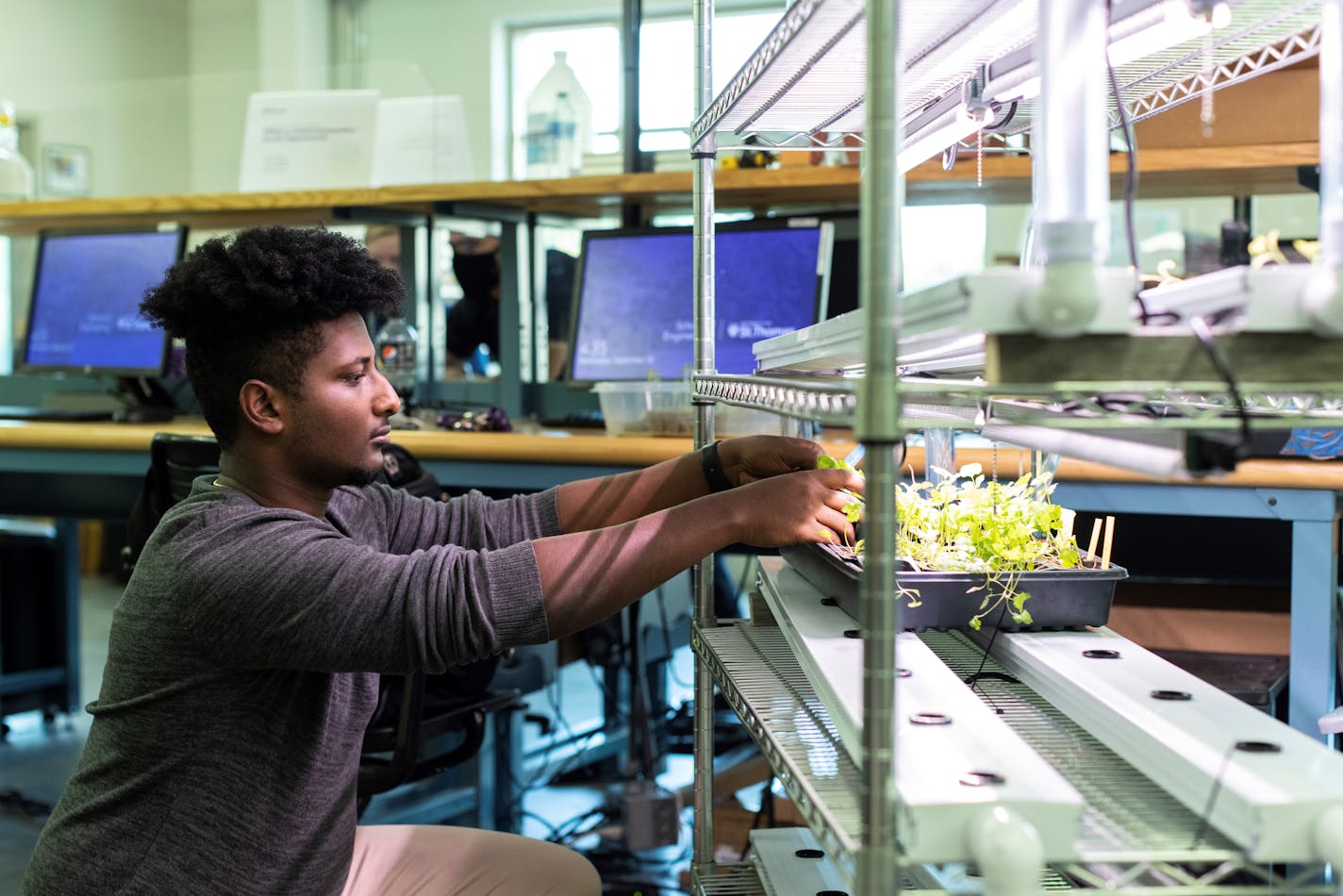 Engineering transfer student Dagmawe Mamo works on his senior design team's hydroponic system in the Facilities and Design Center on September 29, 2021 in St. Paul.