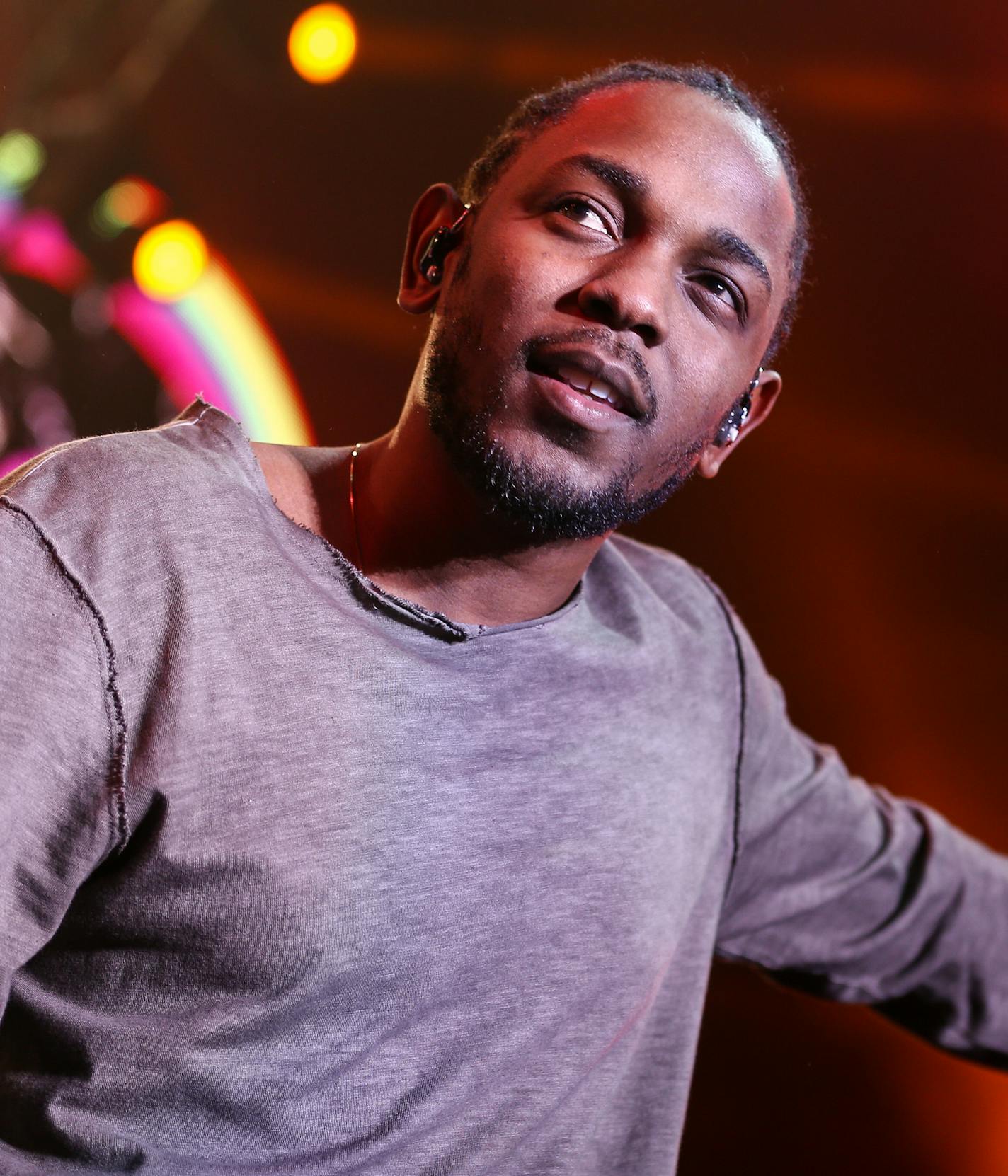 FILE - In this Dec. 4, 2015 file photo, Kendrick Lamar performs at Power 106's 'Cali Christmas' 2015 in Inglewood, Calif. Lamar's "To Pimp a Butterfly," is nominated for a Grammy for album of the year. His song "Alright," is also nominated for song of the year and best rap performance. (Photo by John Salangsang/Invision/AP, File)