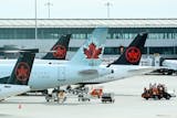 Air Canada planes on the tarmac at Pearson International airport.