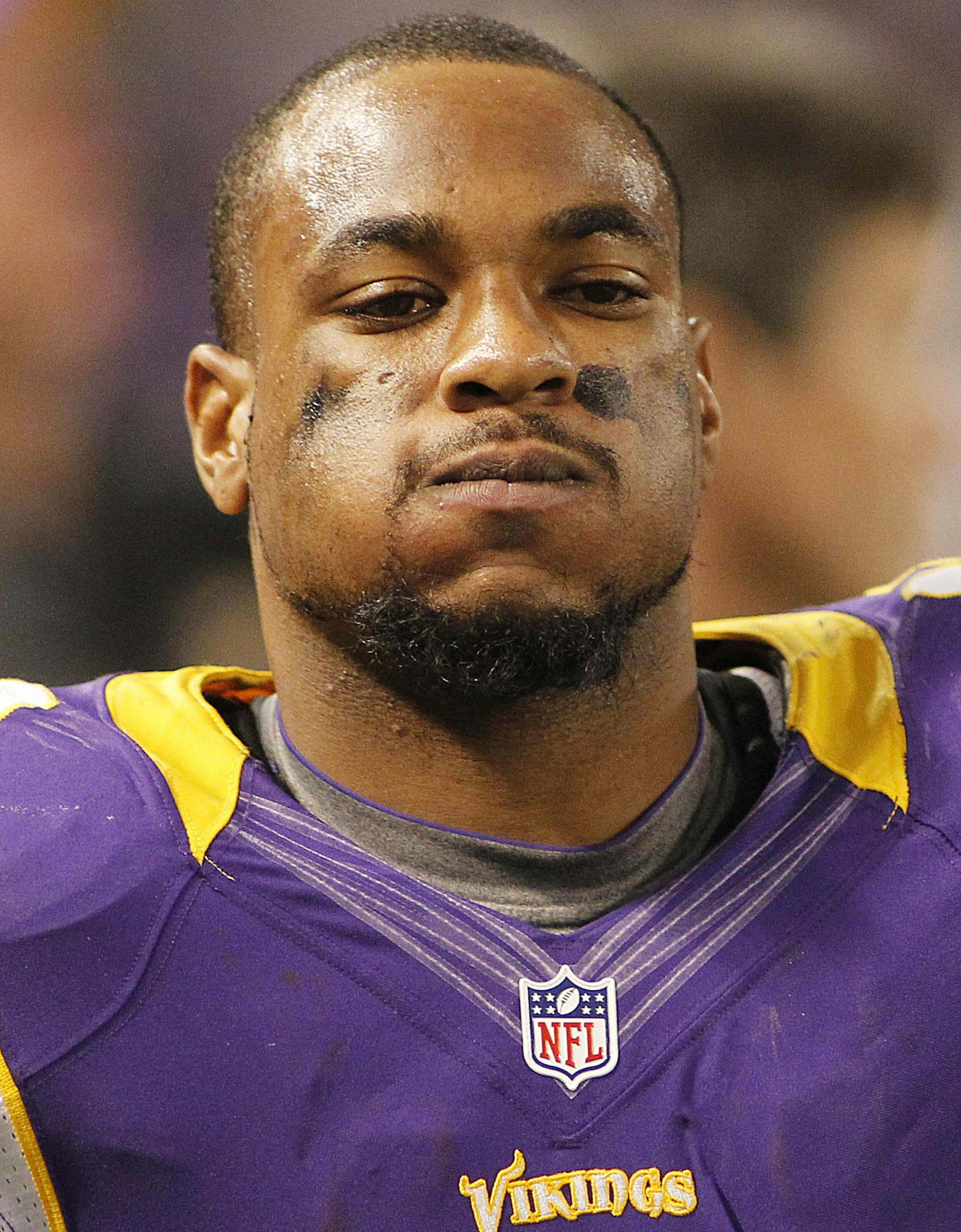 Minnesota Vikings wide receiver Percy Harvin (12) looks on on from the bench during the second half of an NFL football game against Tampa Bay Buccaneers Thursday, Oct. 25, 2012, in Minneapolis. The Buccaneers won 36-17. (AP Photo/Andy King) ORG XMIT: NYOTK ORG XMIT: MIN1303112050260386