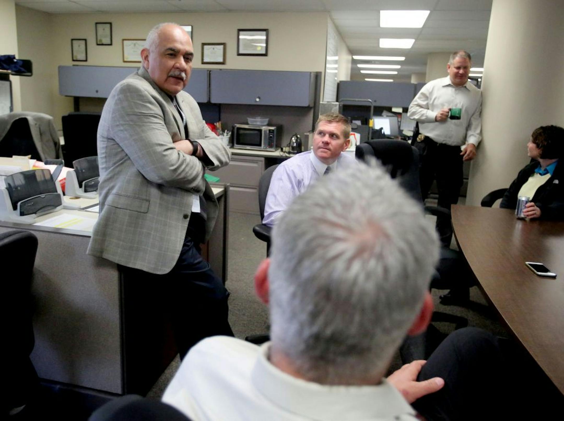 After a more than thirty year career in law enforcement St. Paul Assistant Police Chief Bill Martinez will soon retire. In the short term he is hoping to decompress, train his new golden lab puppy and spend more time with family. Martinez hopes, more than anything, that he will be remembered as a good man during his time on the force. He was seen making his morning rounds to greet officers and detectives Thursday, April 14, 2016, at the St. Paul Police Headquarters in St. Paul, MN.